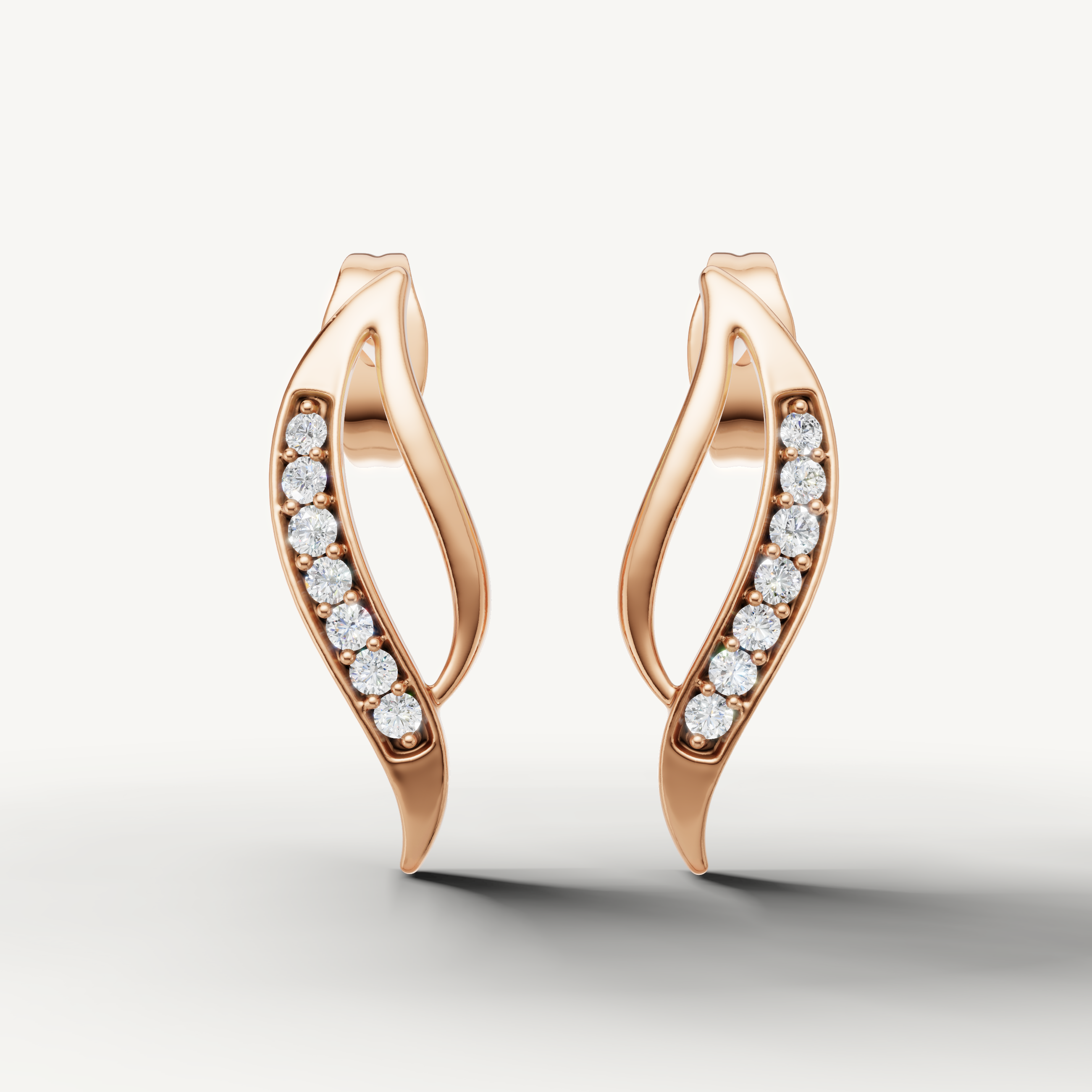 Raul Diamonds rose gold curved diamond stud earrings with elegant modern detailing