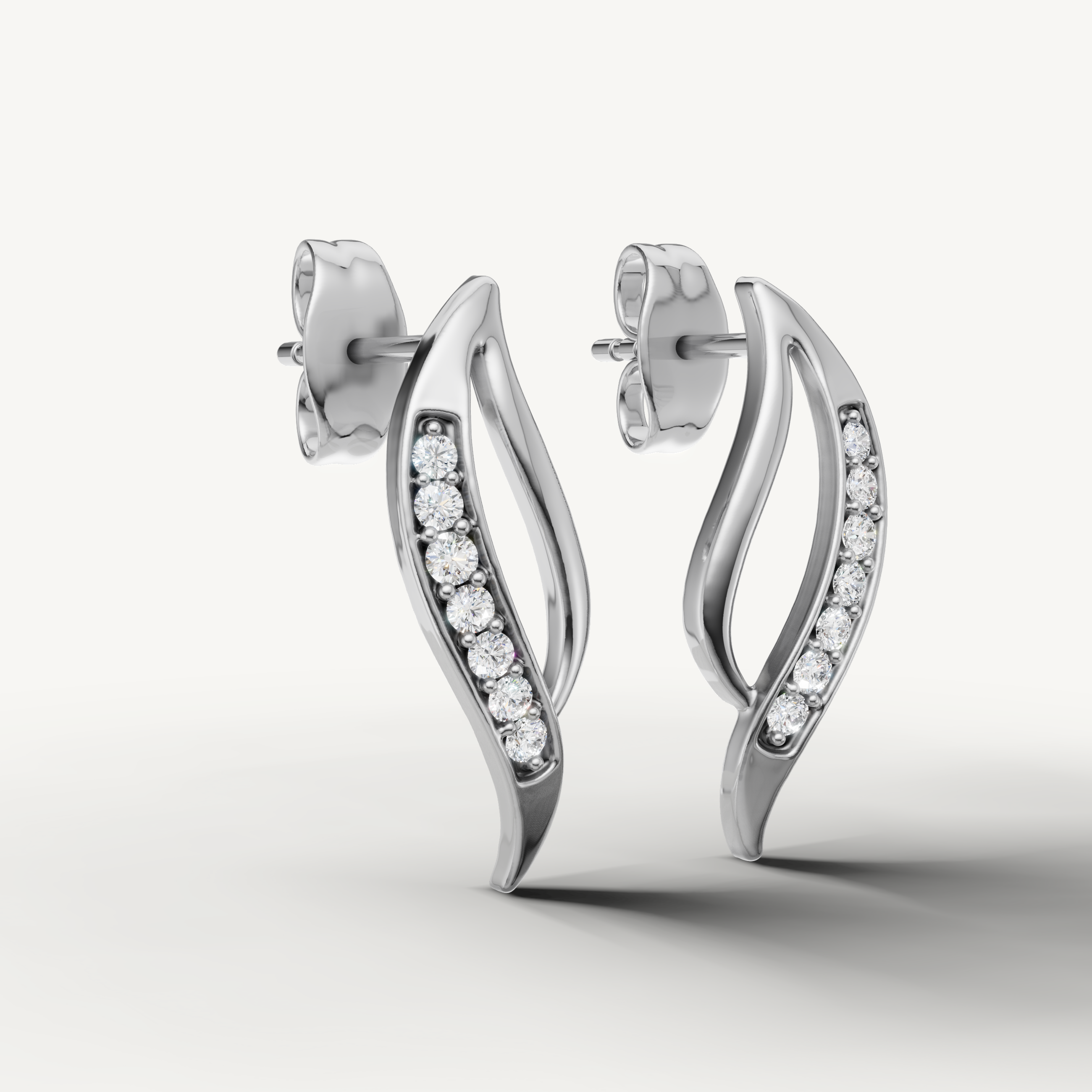 Luxury white gold twisted pave diamond earrings for women by Raul Diamonds