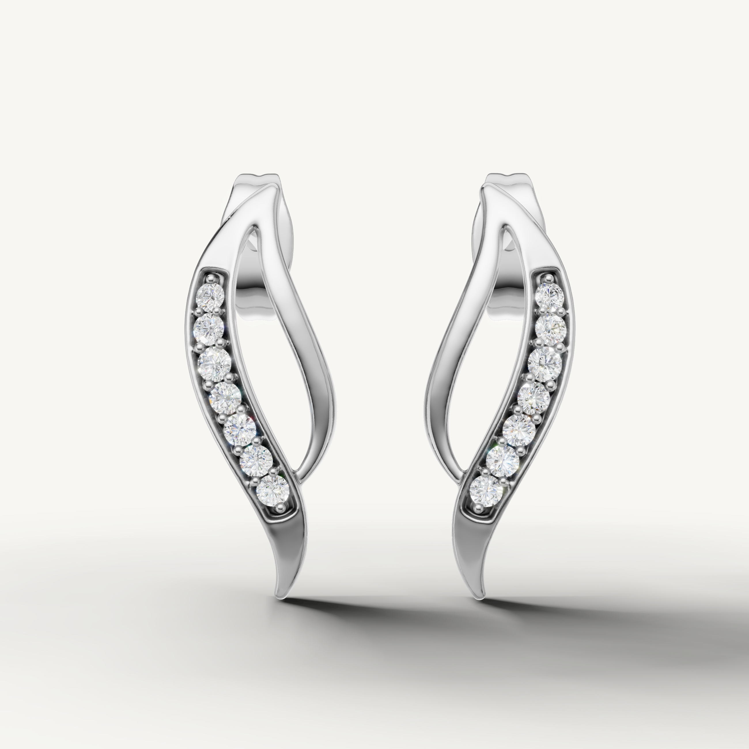 Raul Diamonds white gold curved diamond stud earrings with timeless elegant sparkle