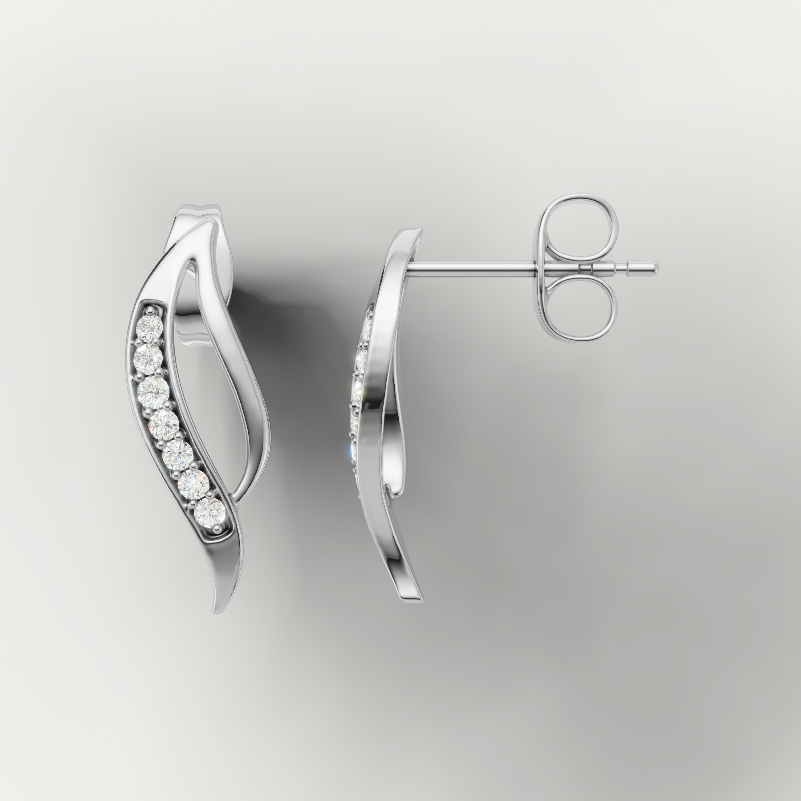 White gold wave style diamond earrings by Raul Diamonds with luxury craftsmanship