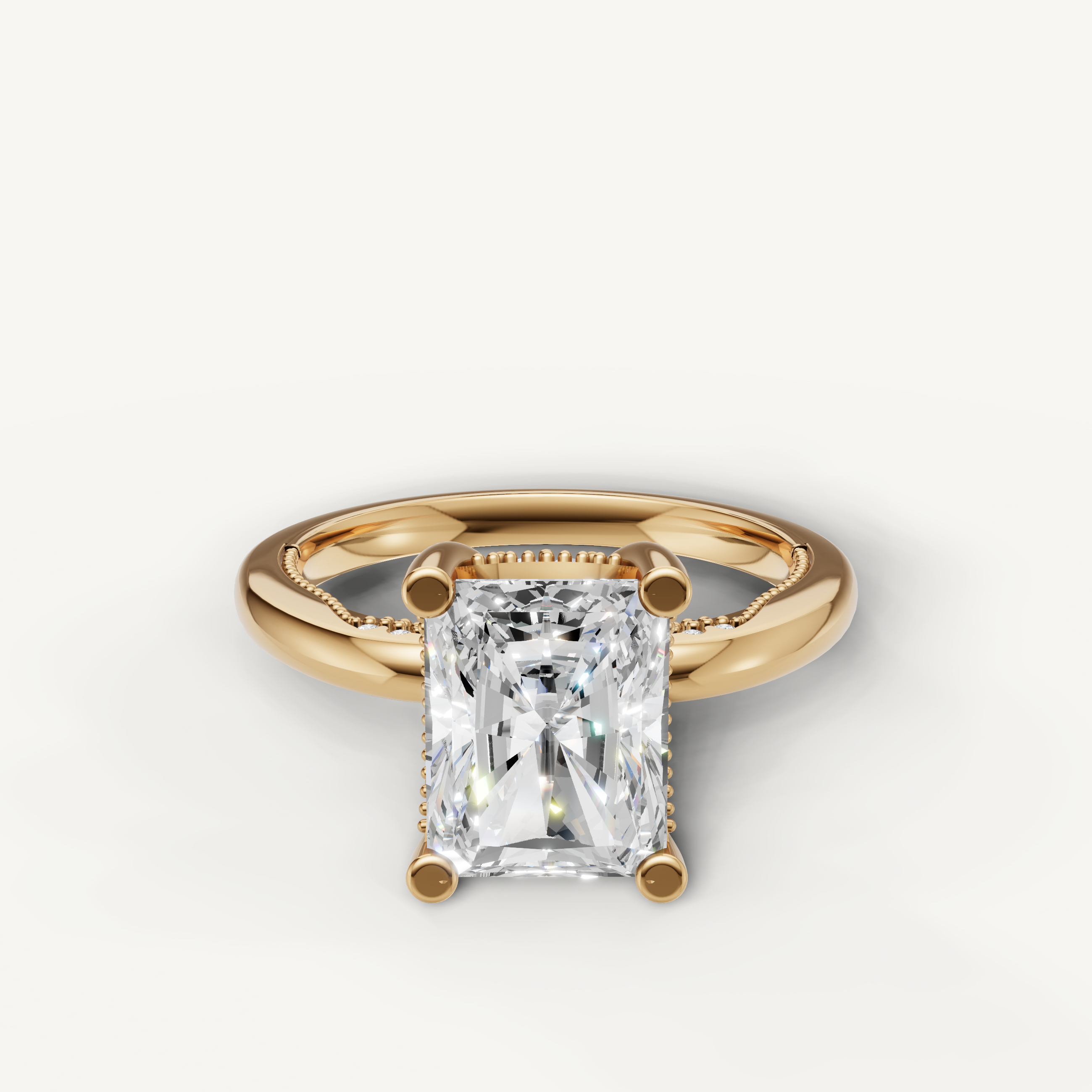 A classic solitaire engagement ring in polished 14k yellow gold, featuring a brilliant, elongated oval-cut diamond in a secure four-prong setting.