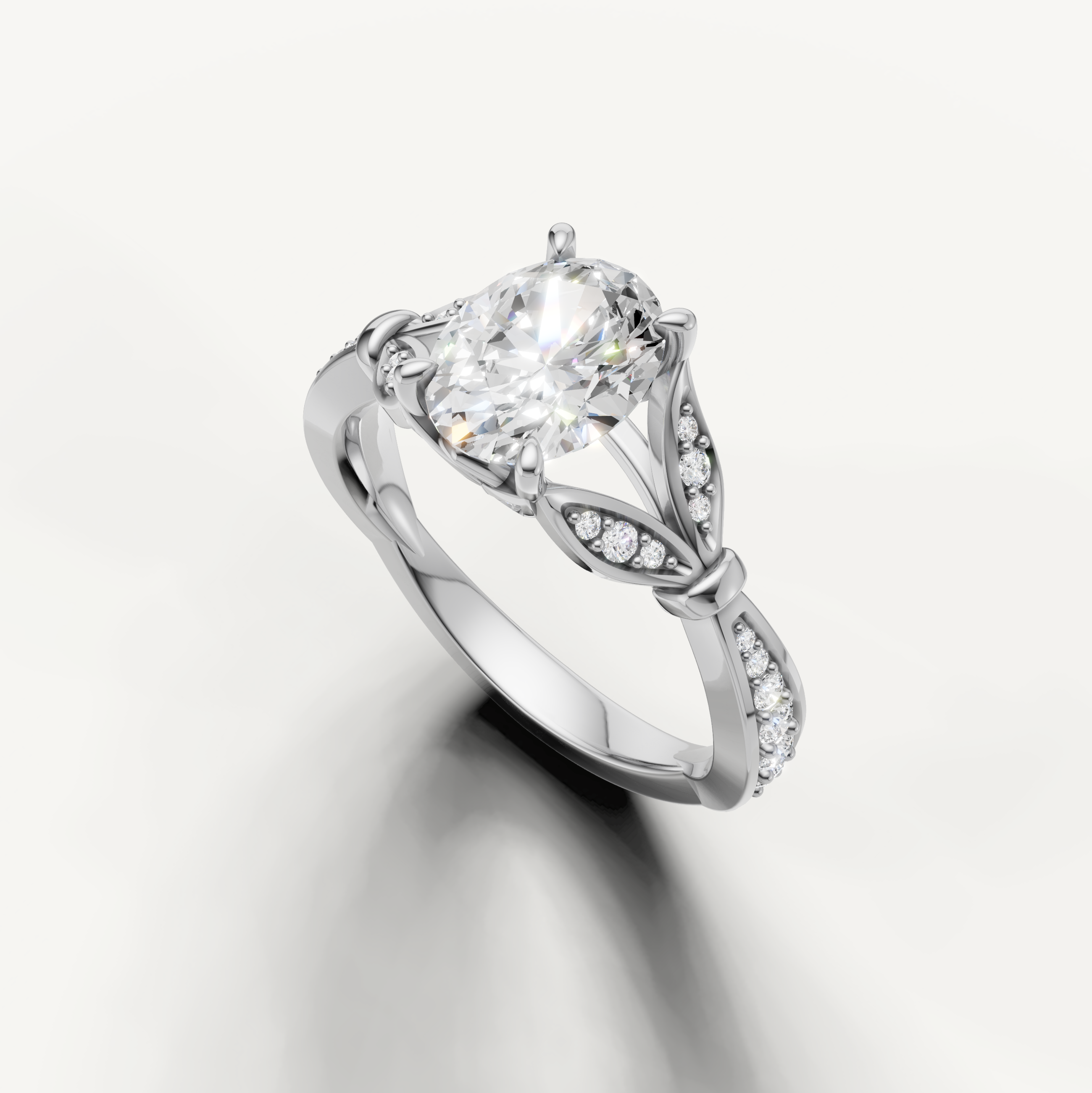 14K white gold oval engagement ring featuring a brilliant elongated lab grown diamond center stone by Raul Diamonds