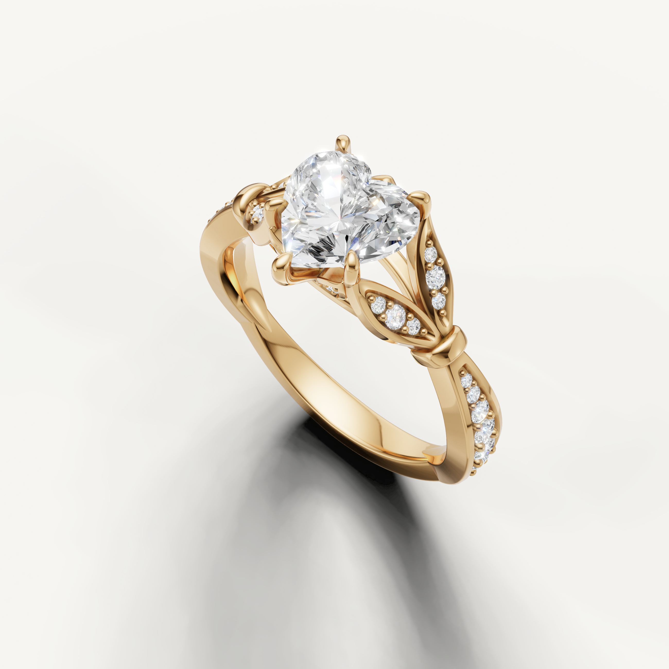 vintage inspired heart diamond ring with intricate filigree detailing yellow gold