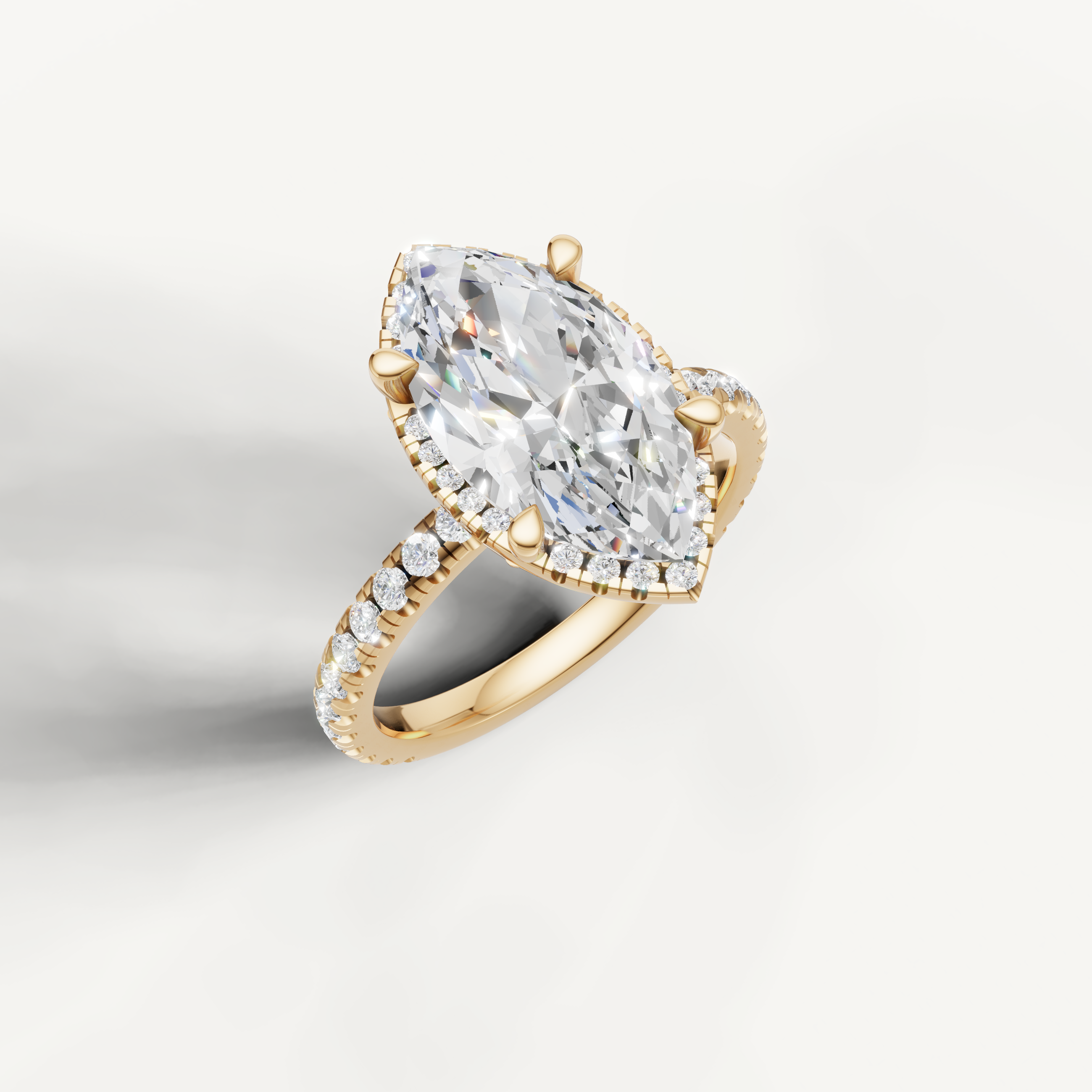 IGI certified marquise diamond ring with hidden halo and pavé band yellow gold setting