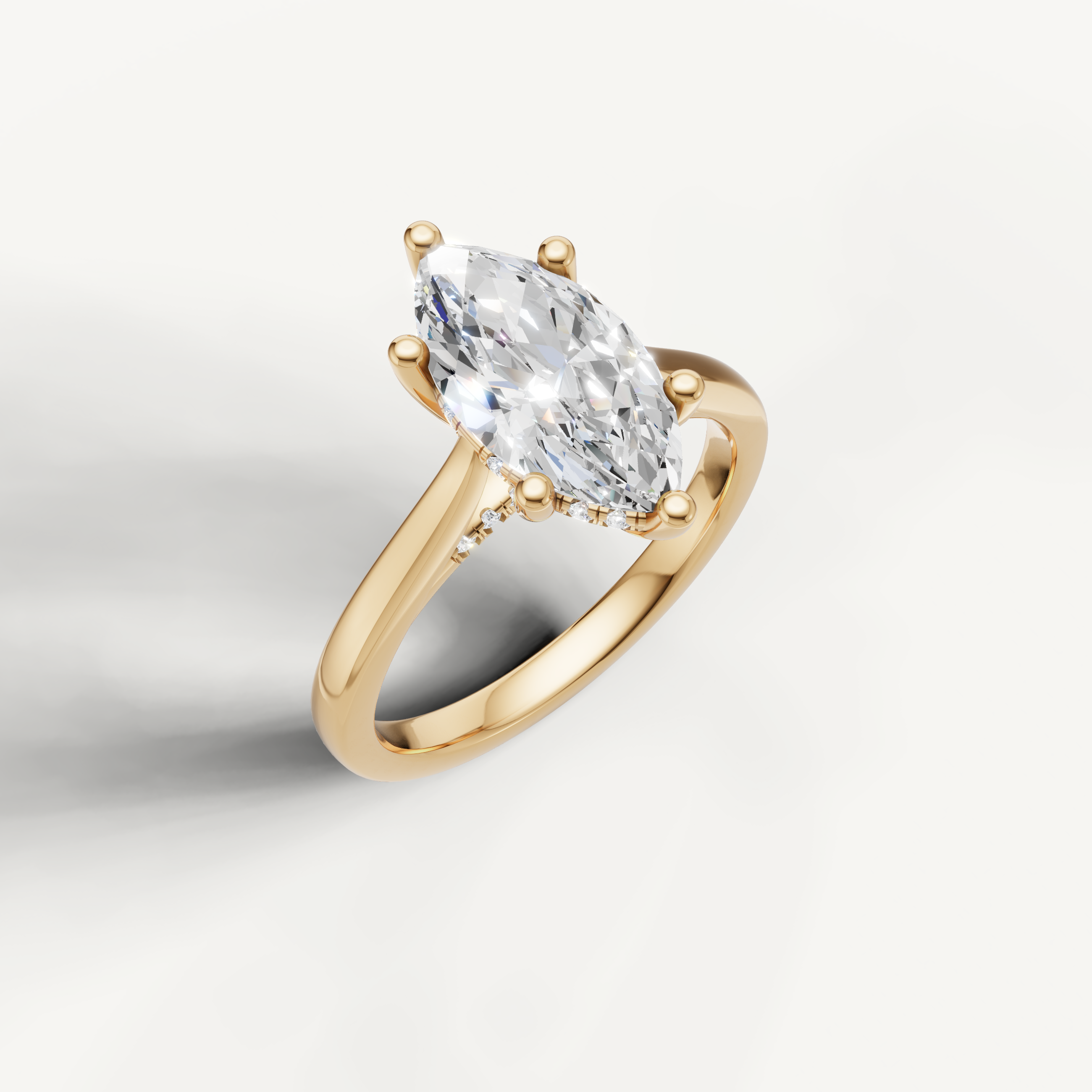 elegant marquise lab grown diamond engagement ring with elongated silhouette in yellow gold