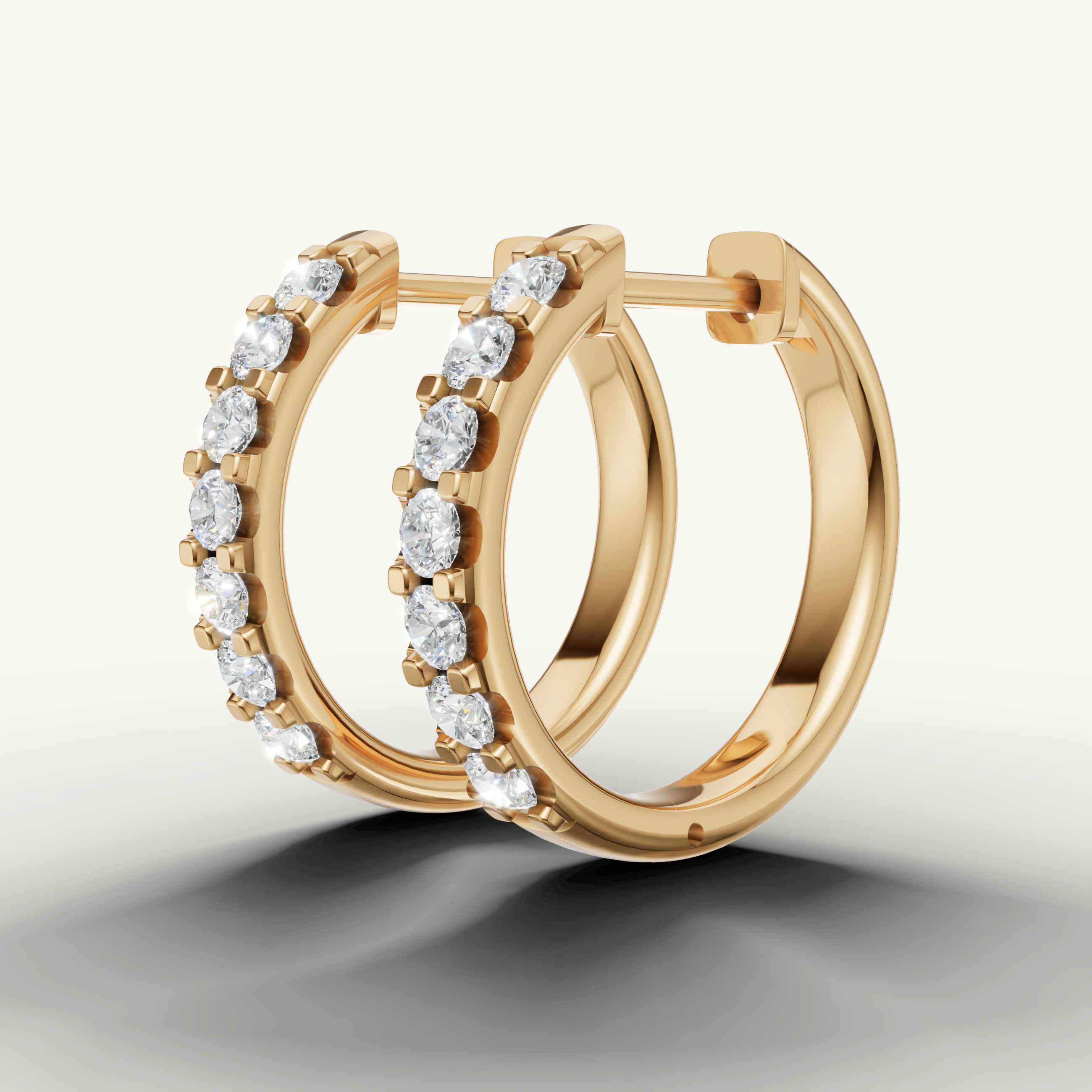 Raul Diamonds yellow gold pave diamond hoop earrings with modern fine jewelry styling