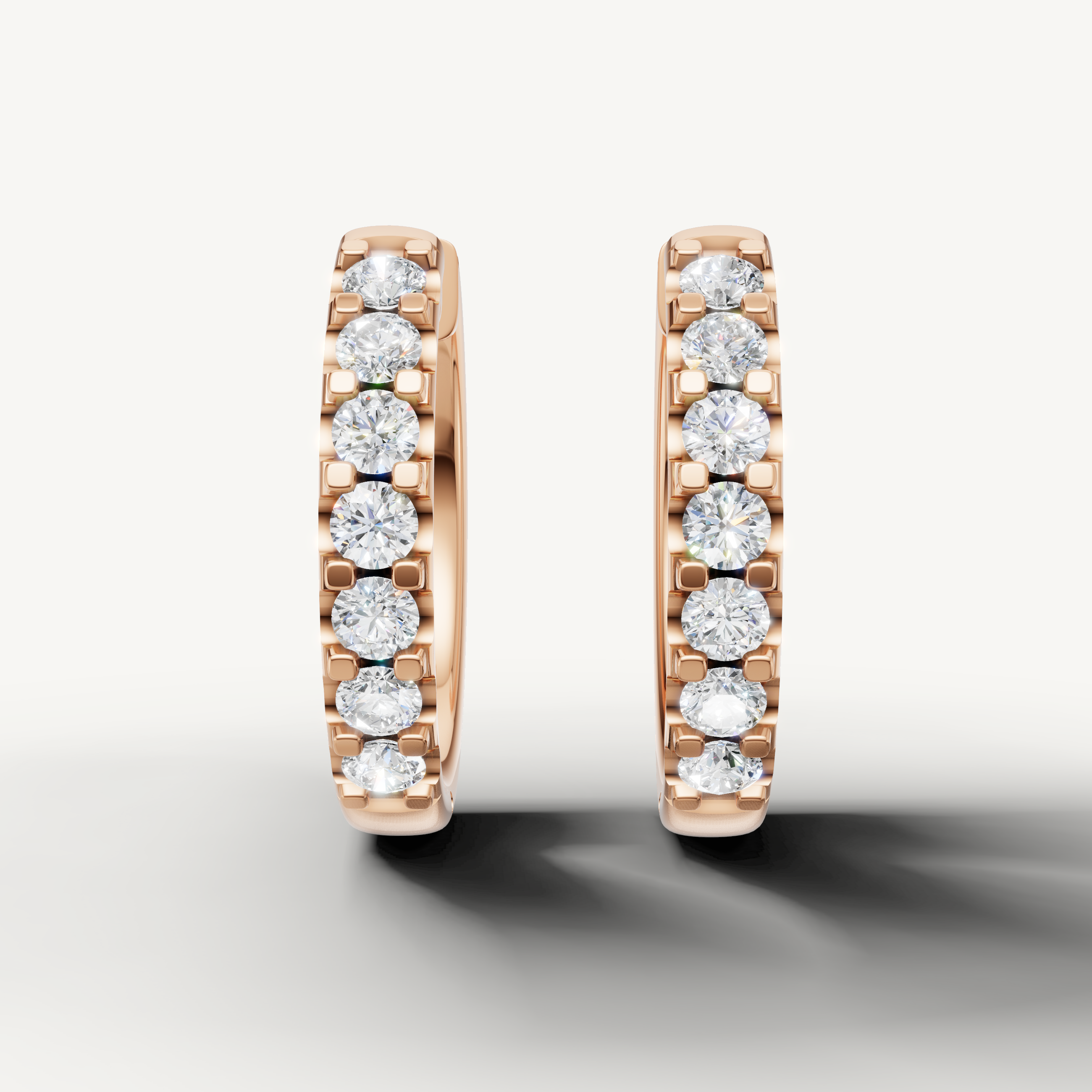 Raul Diamonds rose gold diamond hoop earrings with sparkling round brilliant diamonds