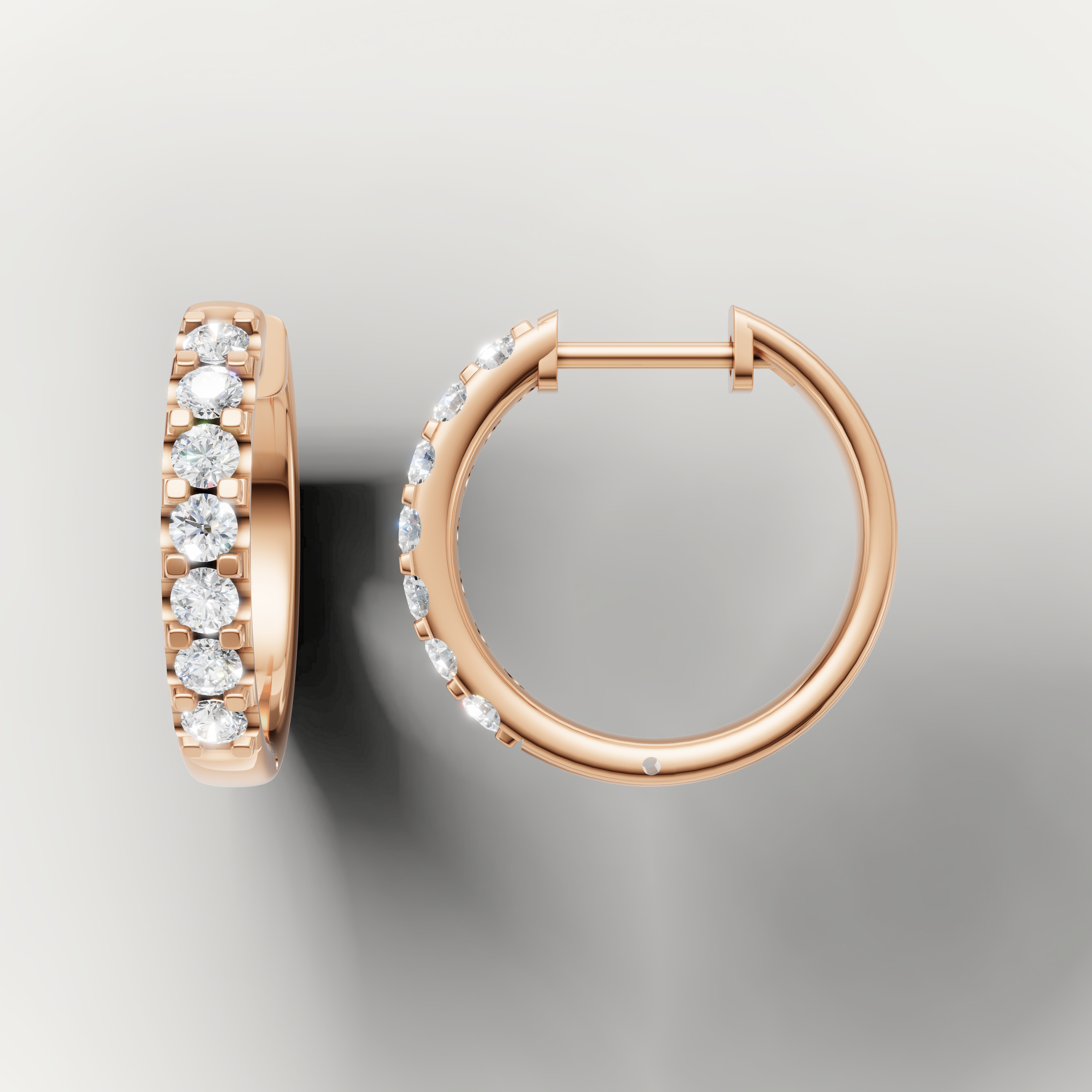 Rose gold pave diamond huggie earrings by Raul Diamonds featuring elegant luxury craftsmanship