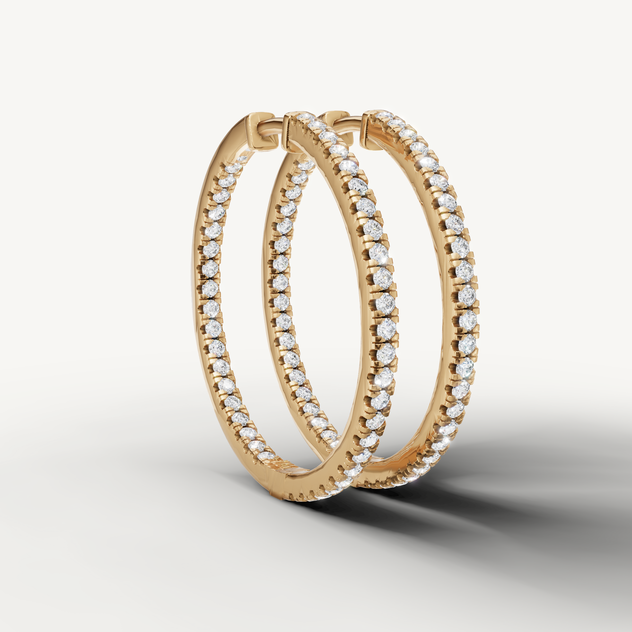 Luxury yellow gold diamond hoop earrings for women with timeless fine jewelry craftsmanship by Raul Diamonds