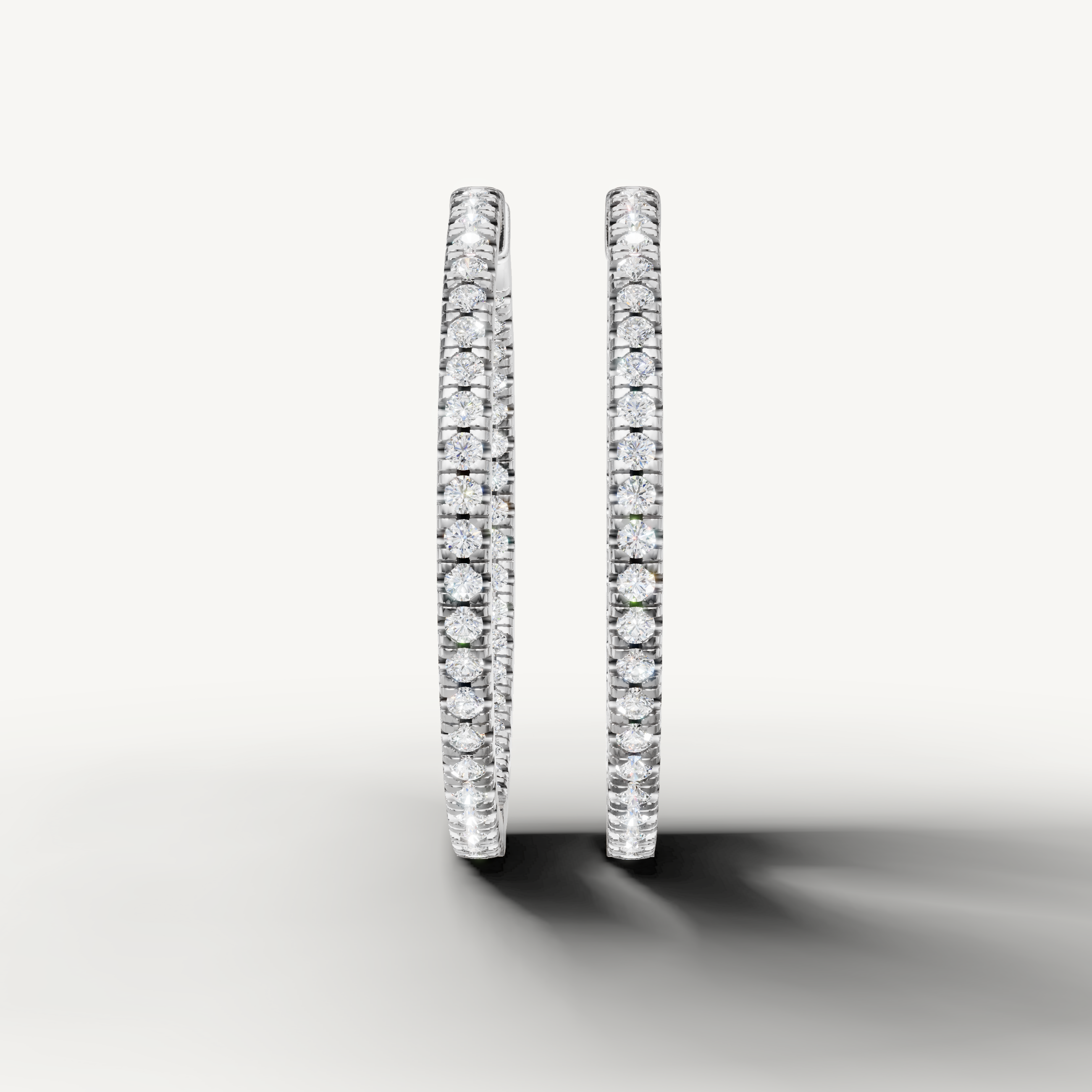 Raul Diamonds white gold diamond hoop earrings with pave round brilliant diamonds