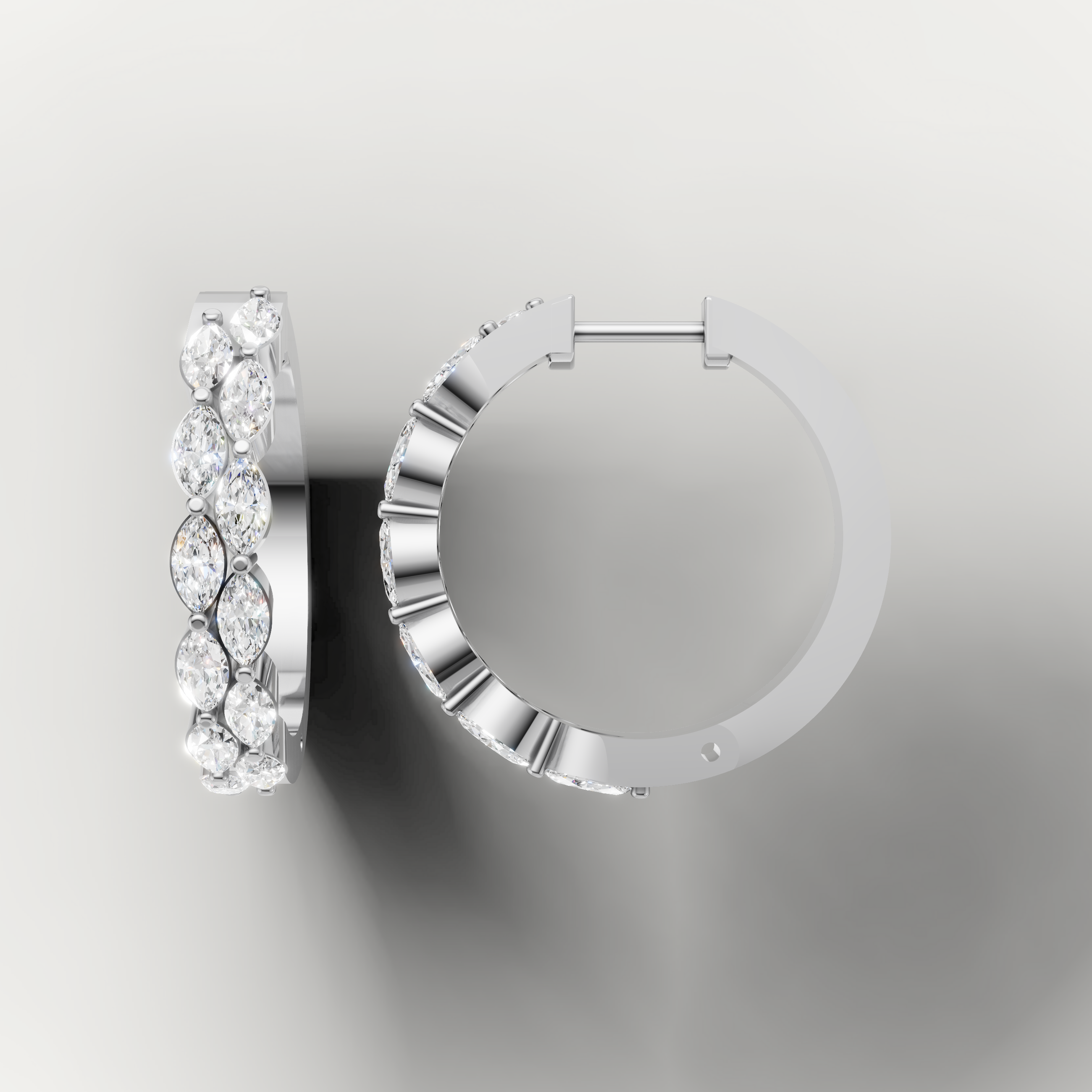 White gold marquise cut diamond hoop earrings by Raul Diamonds featuring timeless elegance