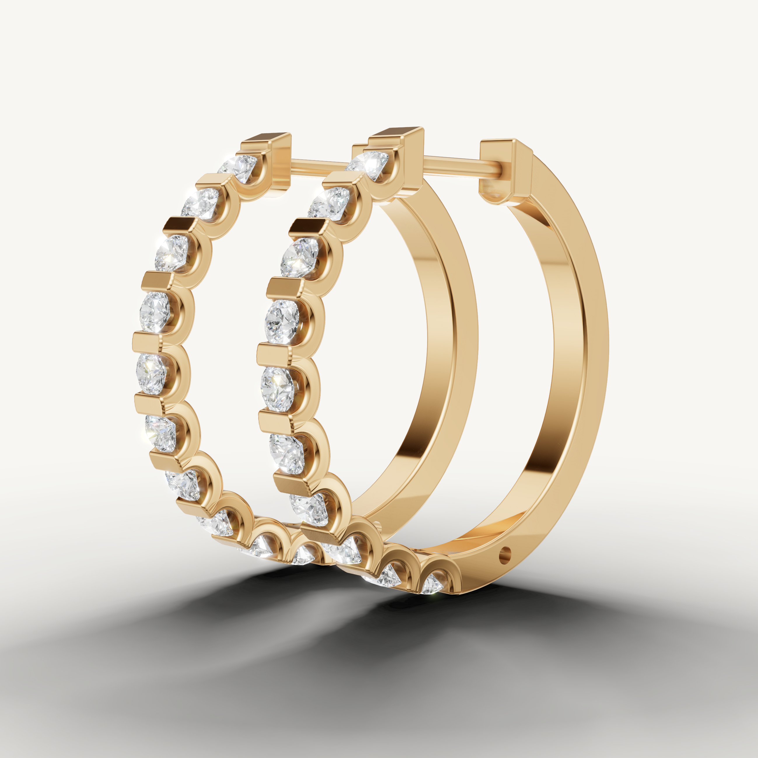 Raul Diamonds yellow gold bezel set diamond hoop earrings with timeless fine jewelry design