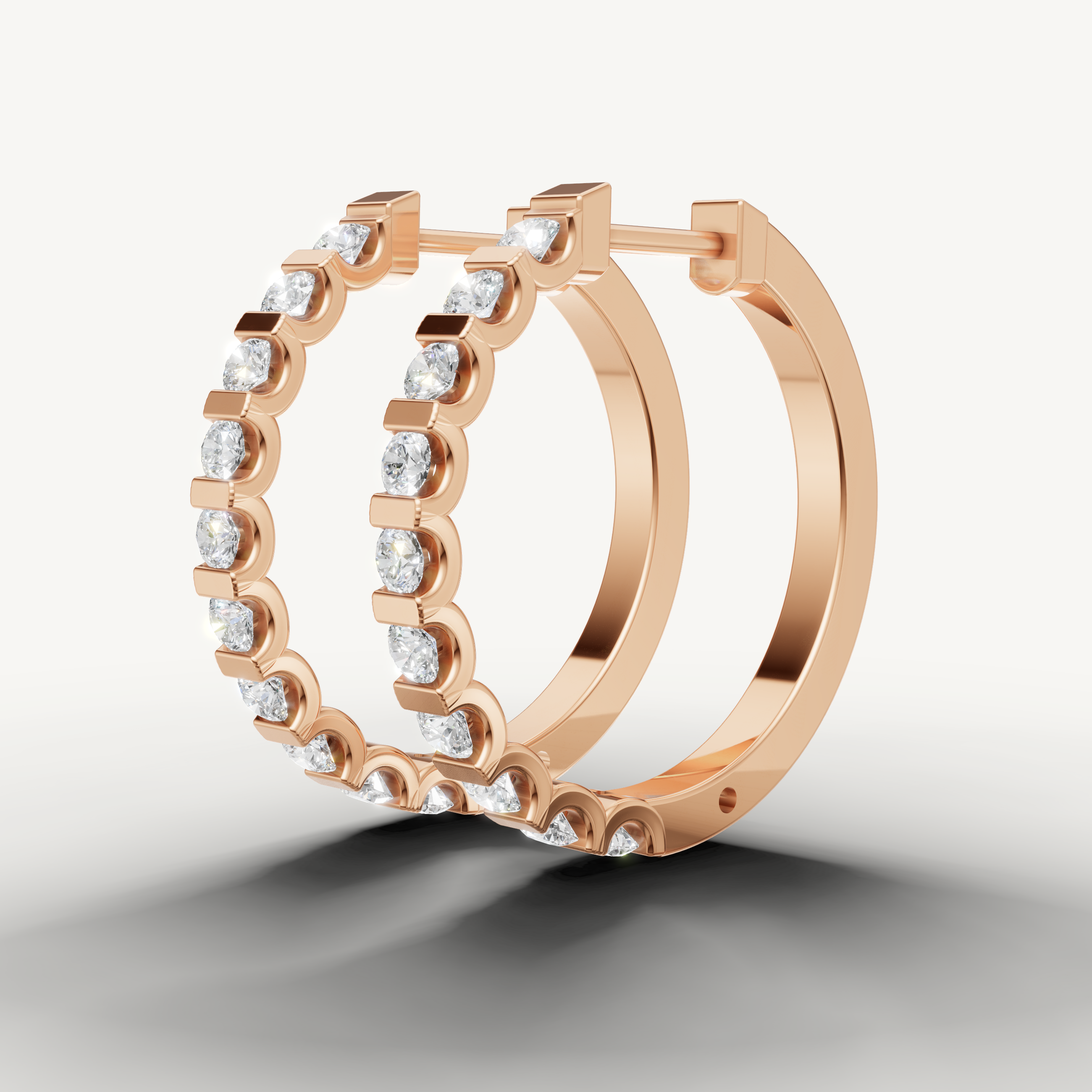 Raul Diamonds rose gold diamond hoop earrings with sleek bezel set elegance and sparkle