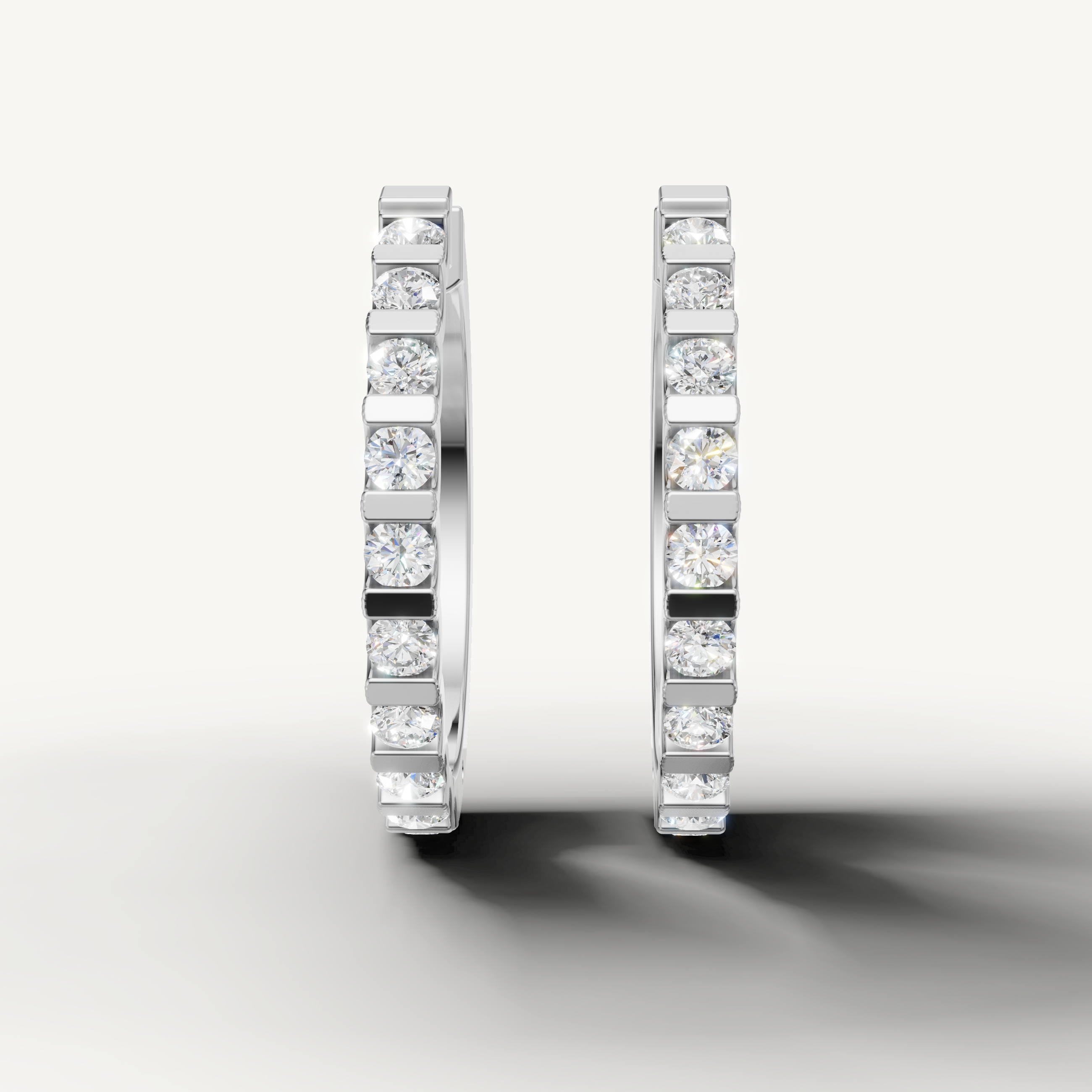 Raul Diamonds white gold diamond hoop earrings with bezel set round brilliant diamonds