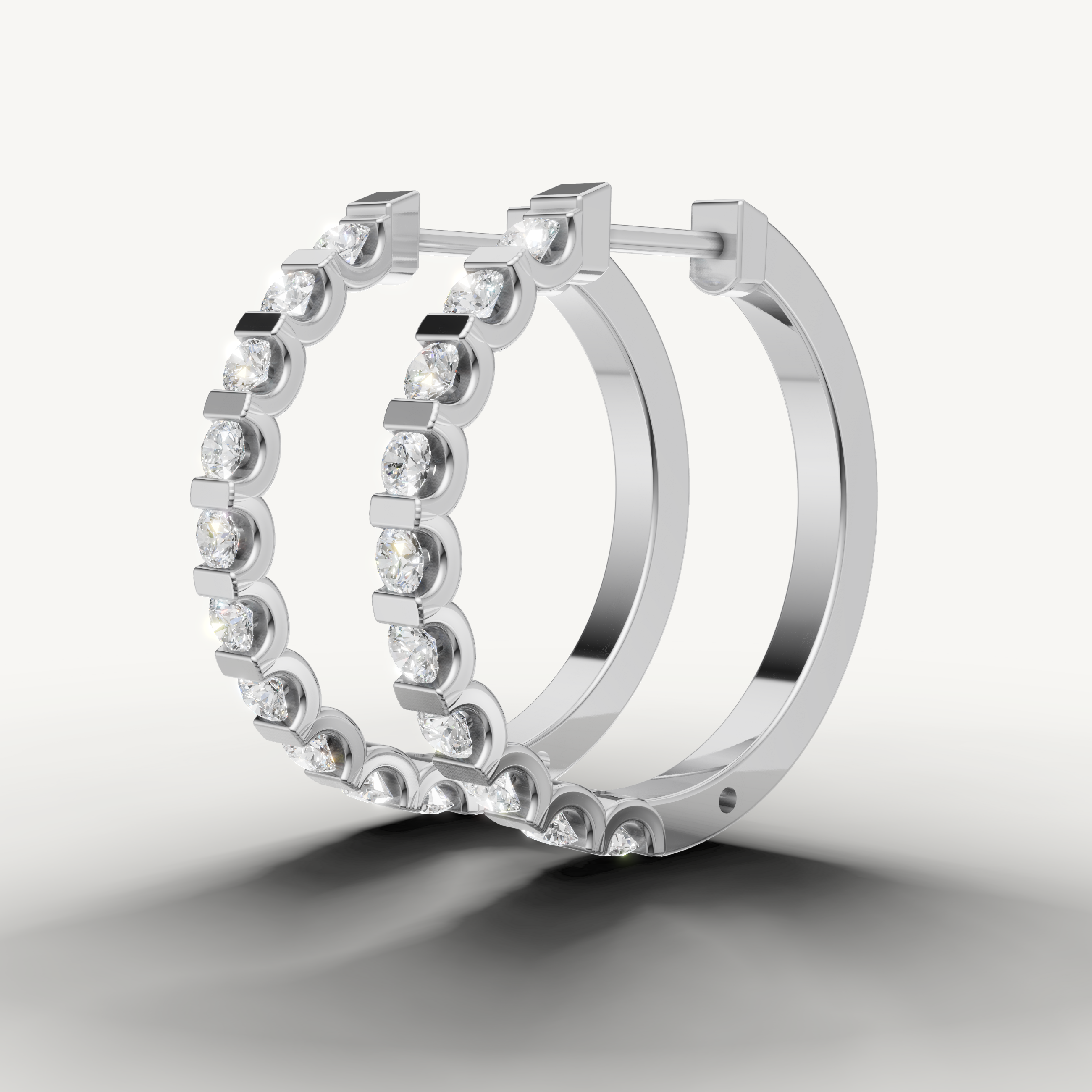 Raul Diamonds white gold bezel set diamond hoop earrings with timeless contemporary design