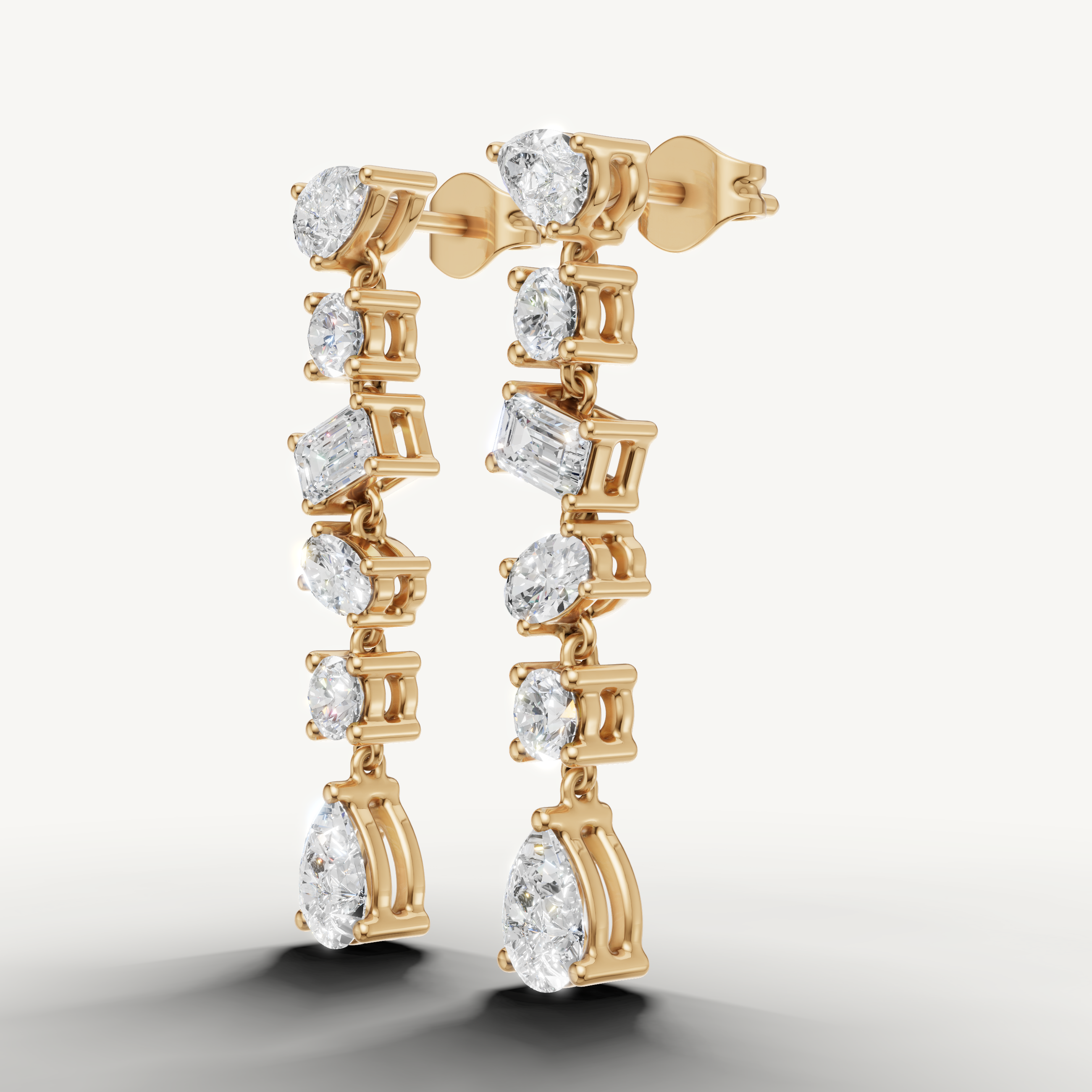 Raul Diamonds yellow gold designer diamond drop earrings with pear and round diamonds