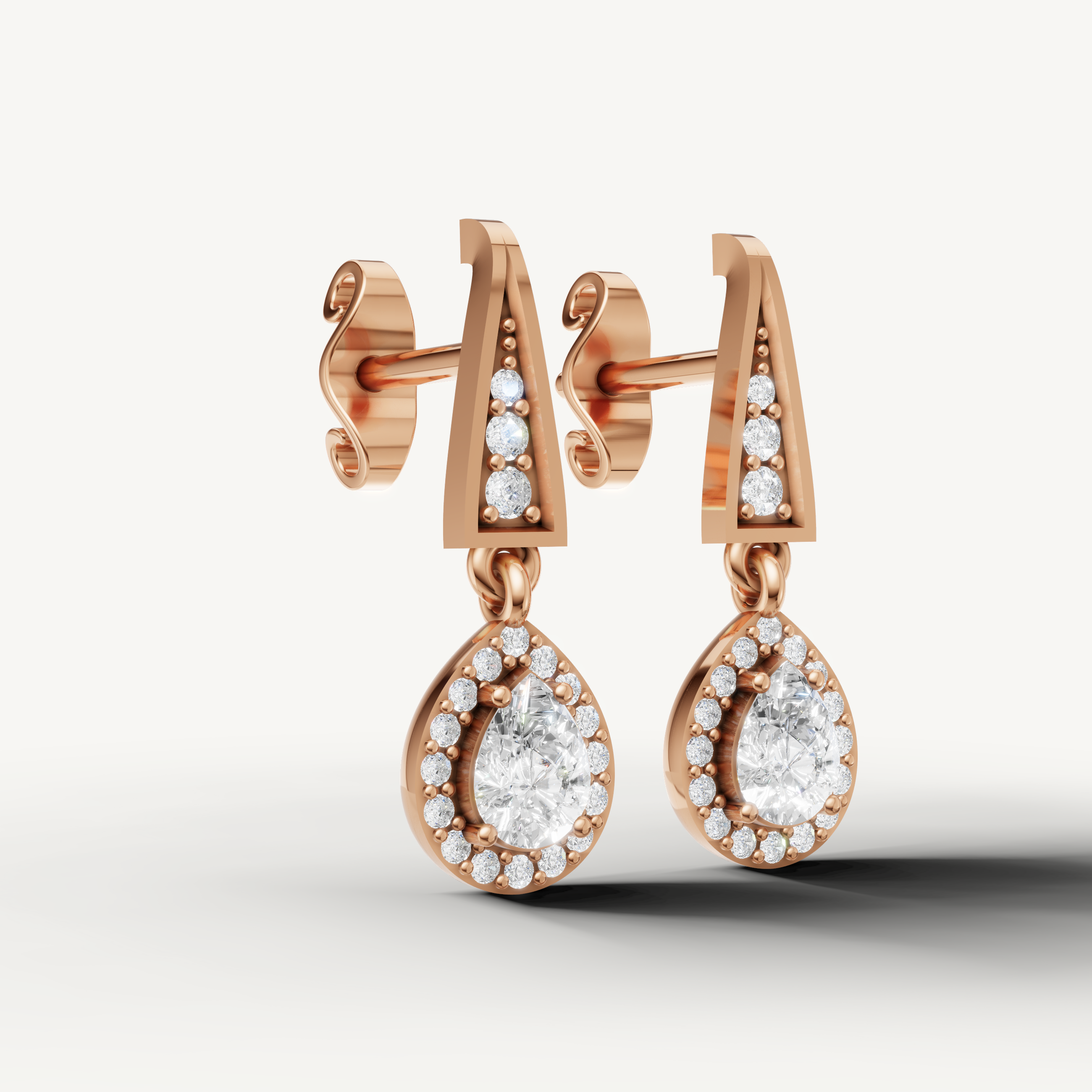 Luxury rose gold pear cut diamond dangle earrings for women by Raul Diamonds