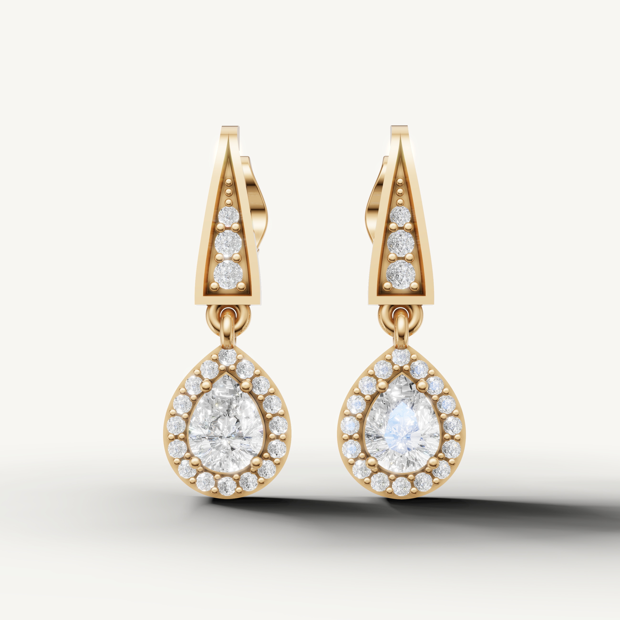 Raul Diamonds yellow gold pear shape diamond drop earrings with halo brilliance