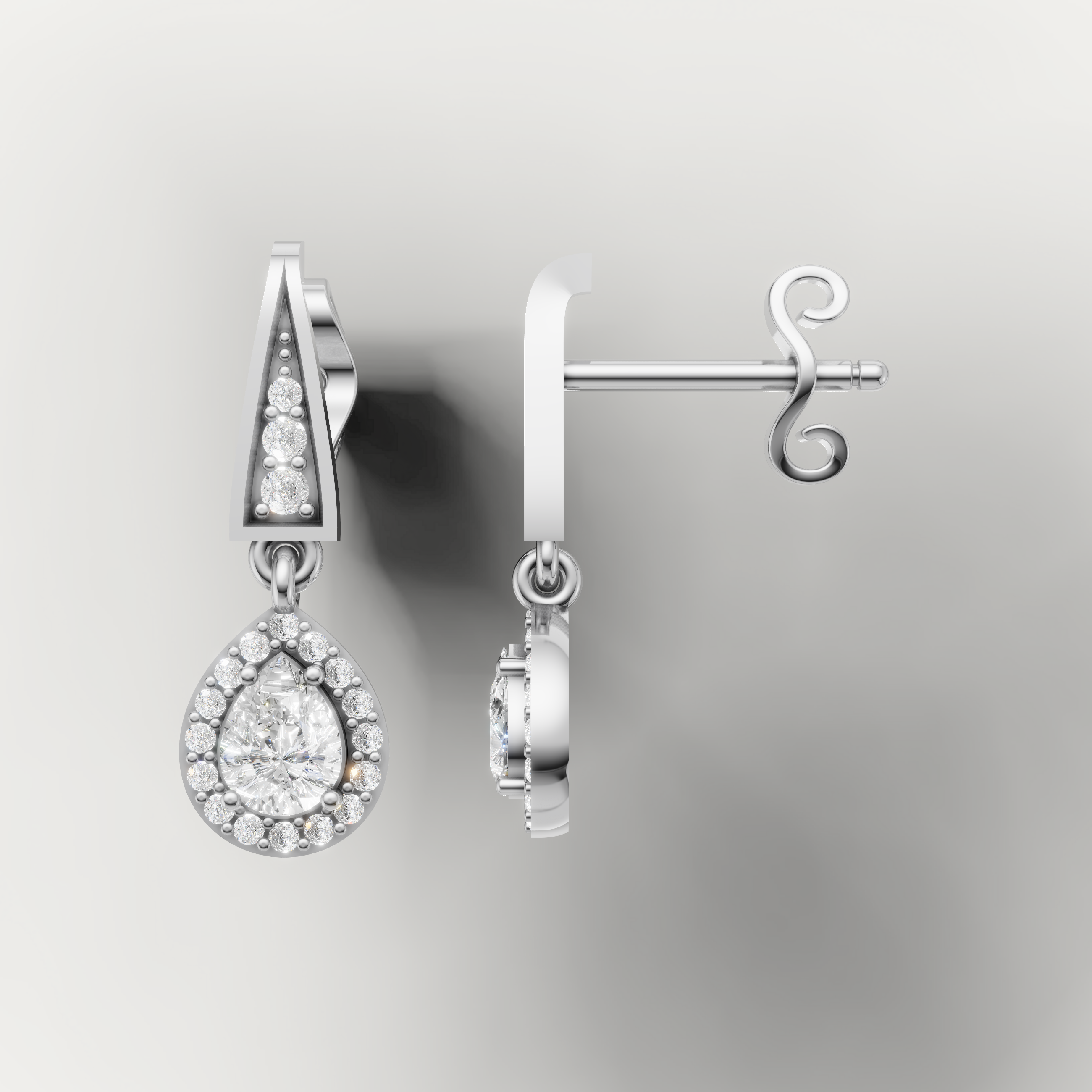 White gold teardrop diamond dangle earrings by Raul Diamonds with timeless elegance