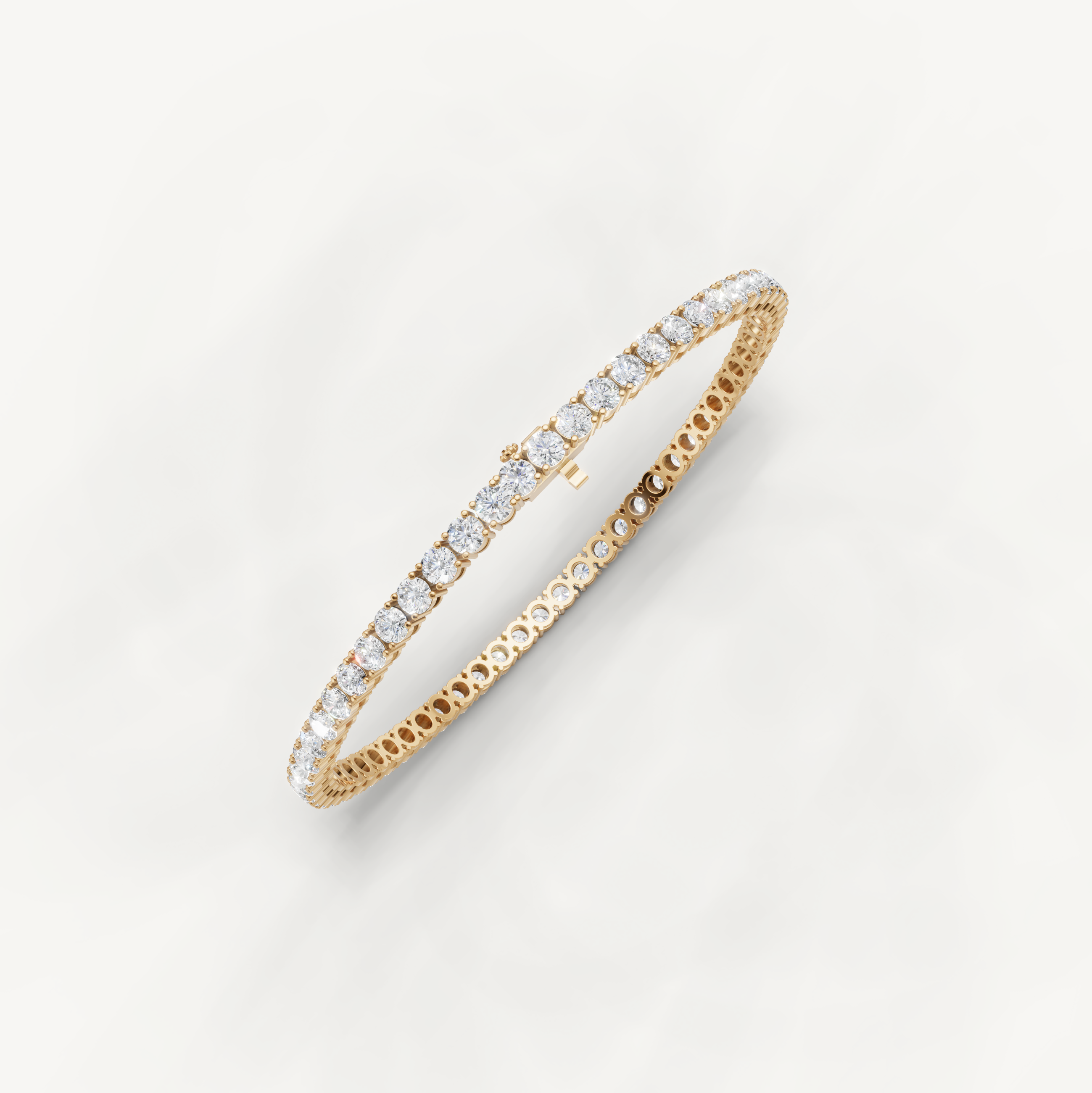 Elegant 5 carat diamond tennis bracelet in polished yellow gold by Raul Diamonds
