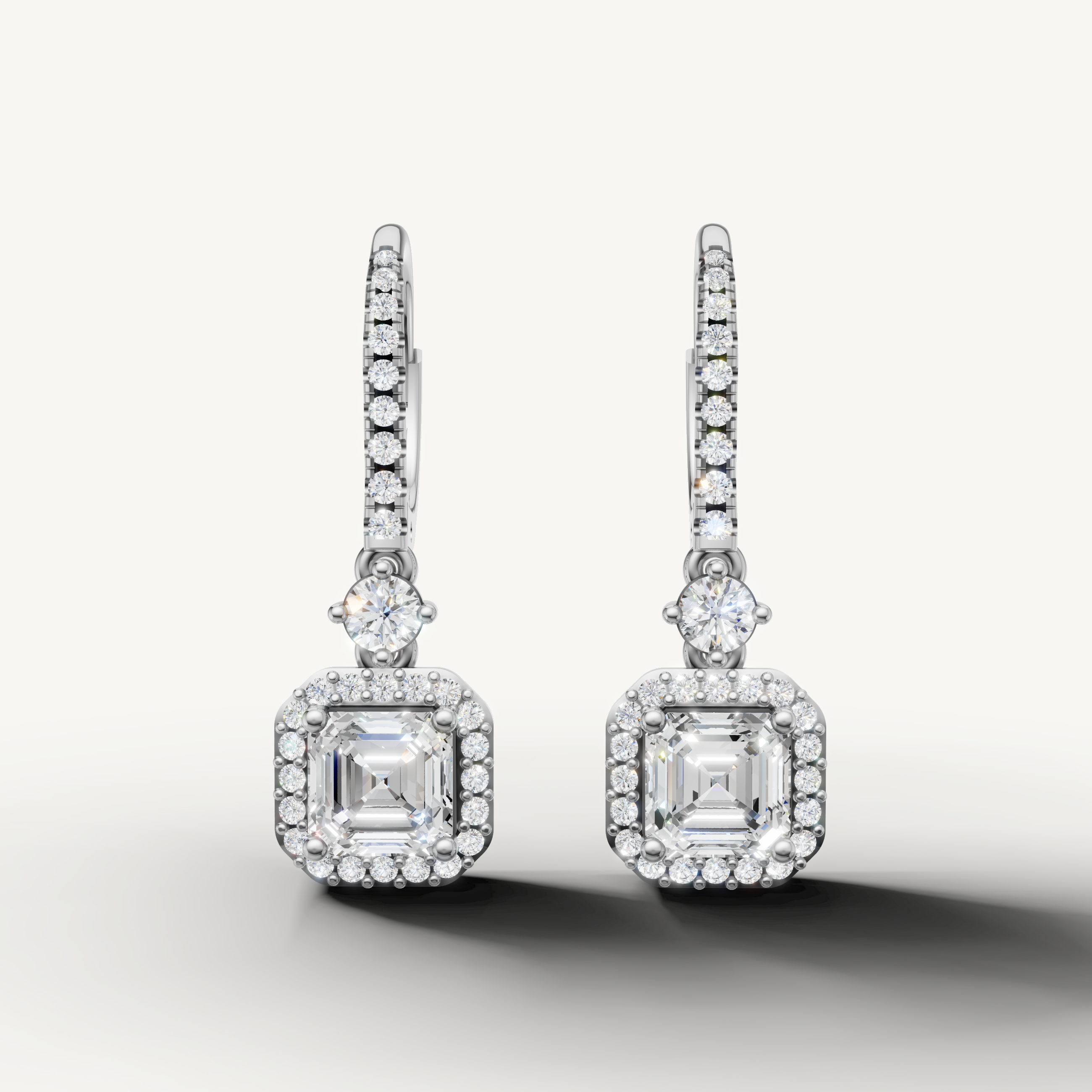 Raul Diamonds white gold asscher cut halo diamond drop earrings with brilliant sparkle