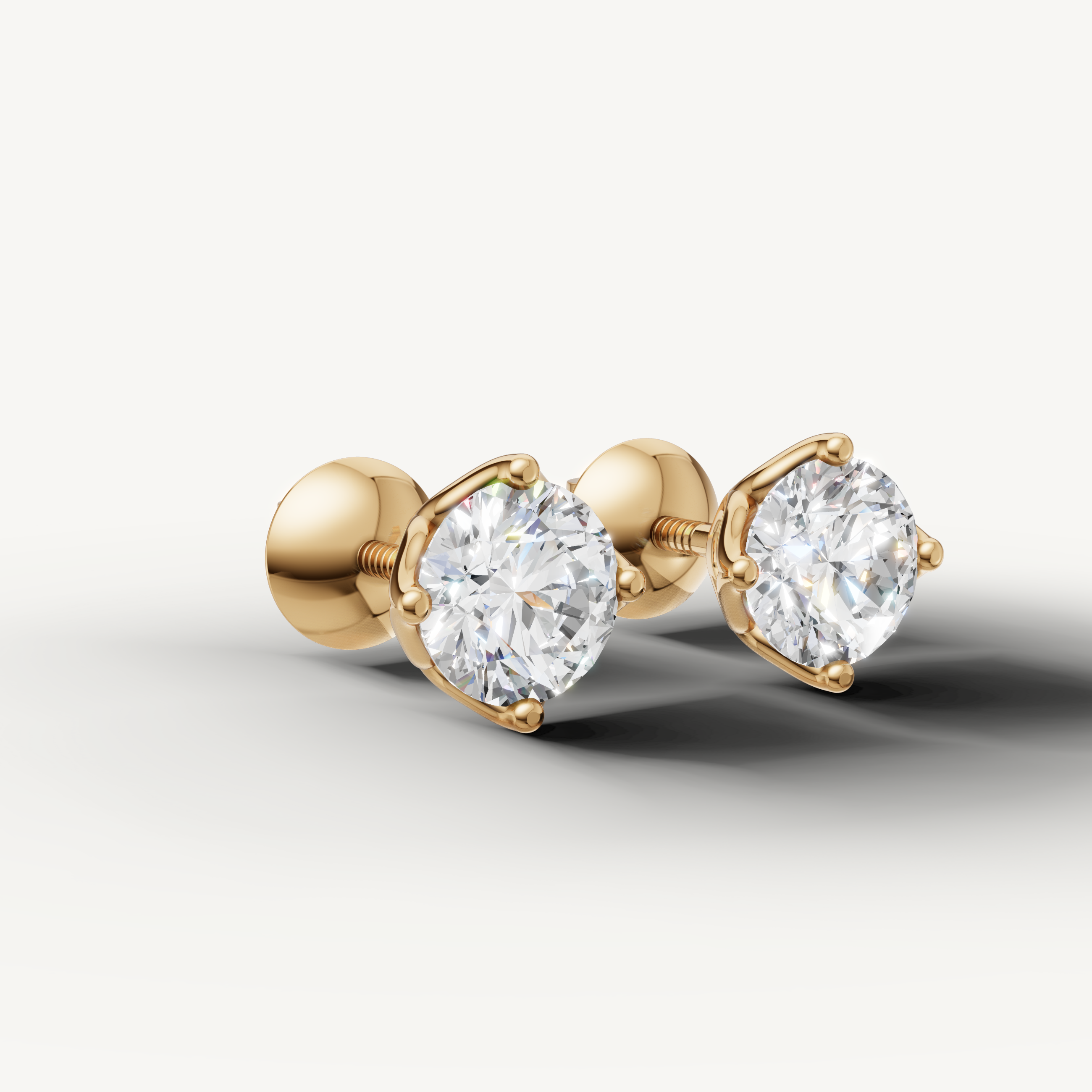 Luxury yellow gold round cut diamond earrings for women by Raul Diamonds