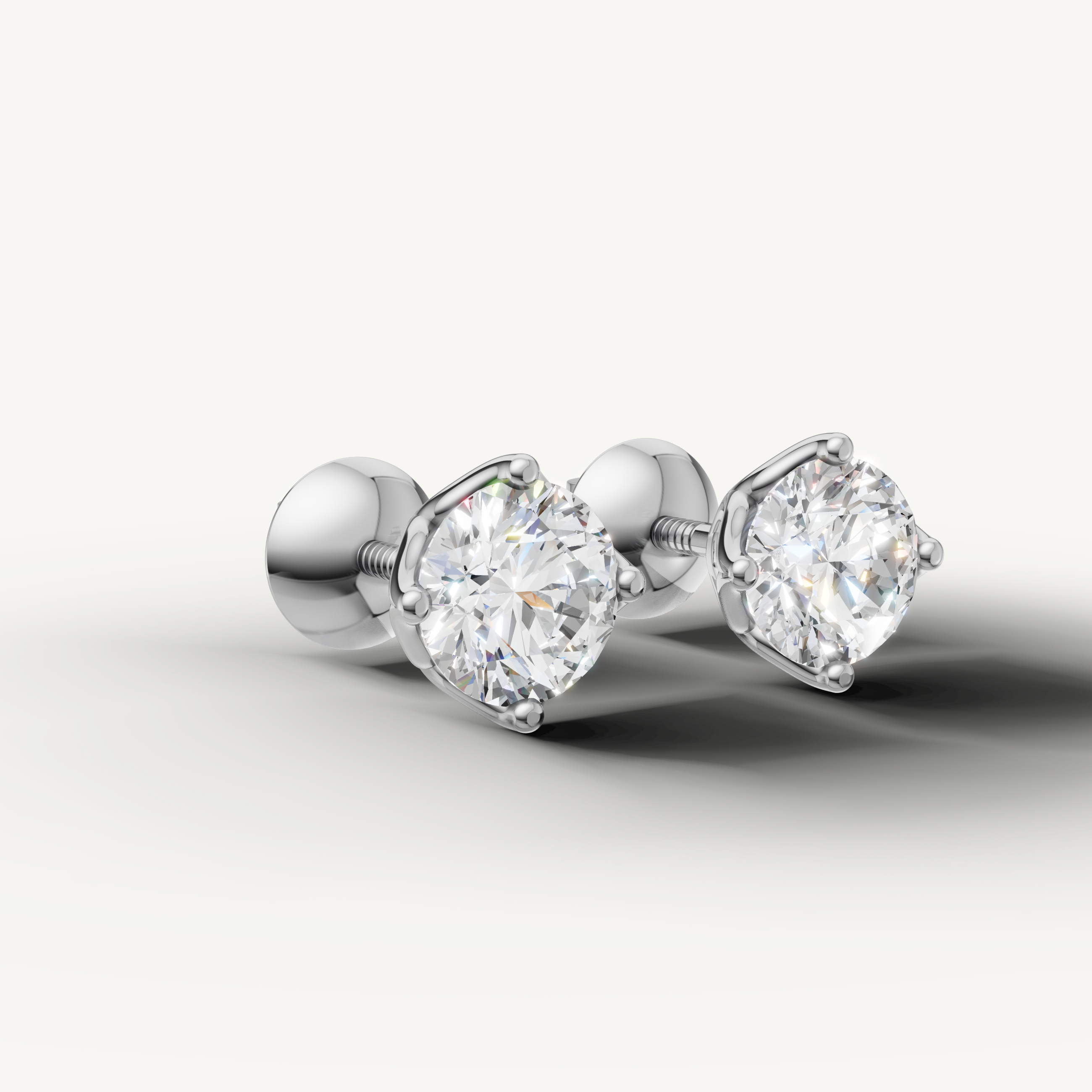 Luxury white gold round cut diamond earrings with timeless craftsmanship by Raul Diamonds