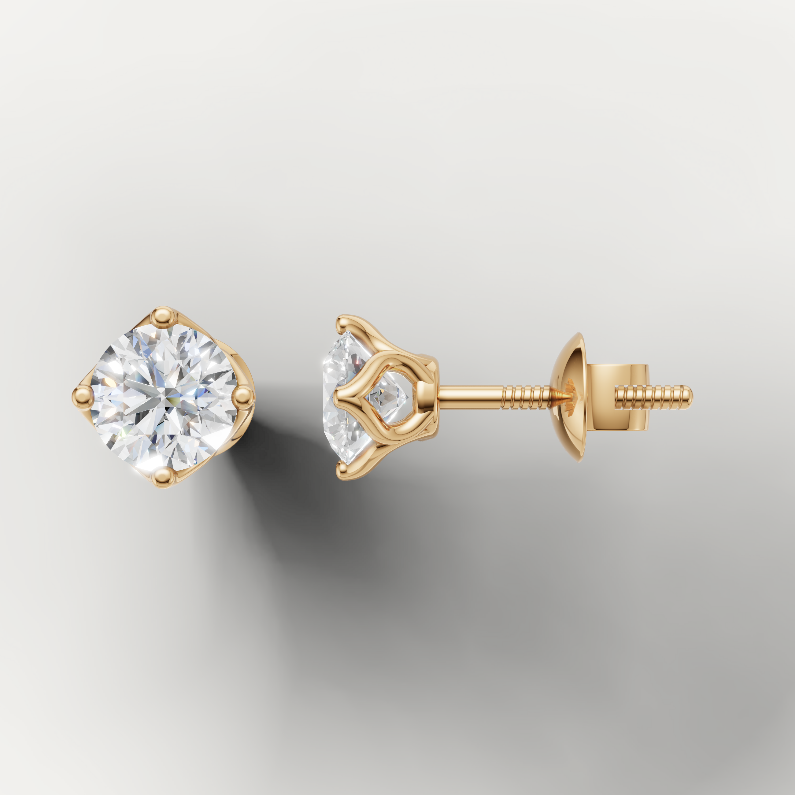 Yellow gold solitaire diamond stud earrings by Raul Diamonds with elegant minimalist design
