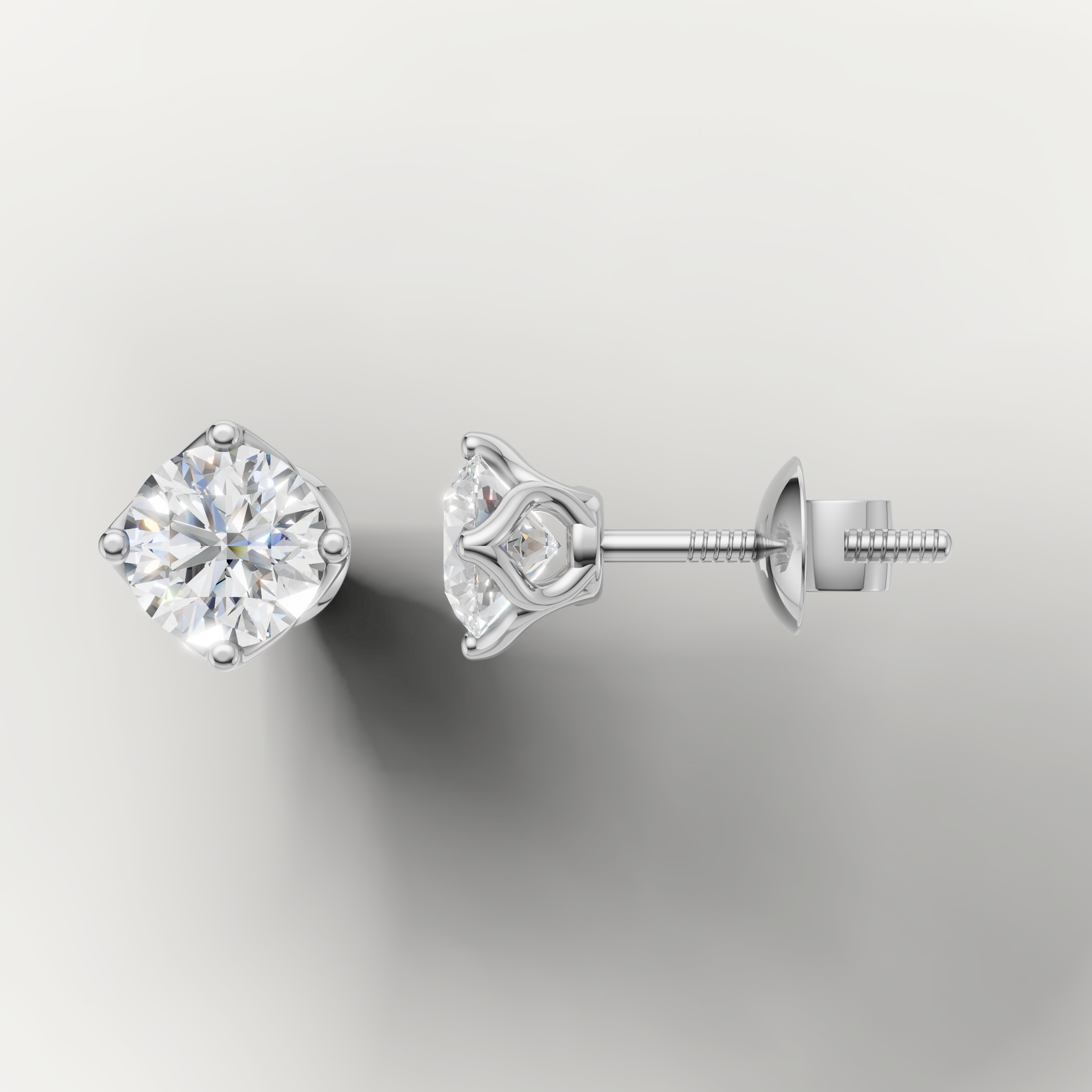 White gold solitaire diamond stud earrings by Raul Diamonds with brilliant sparkle