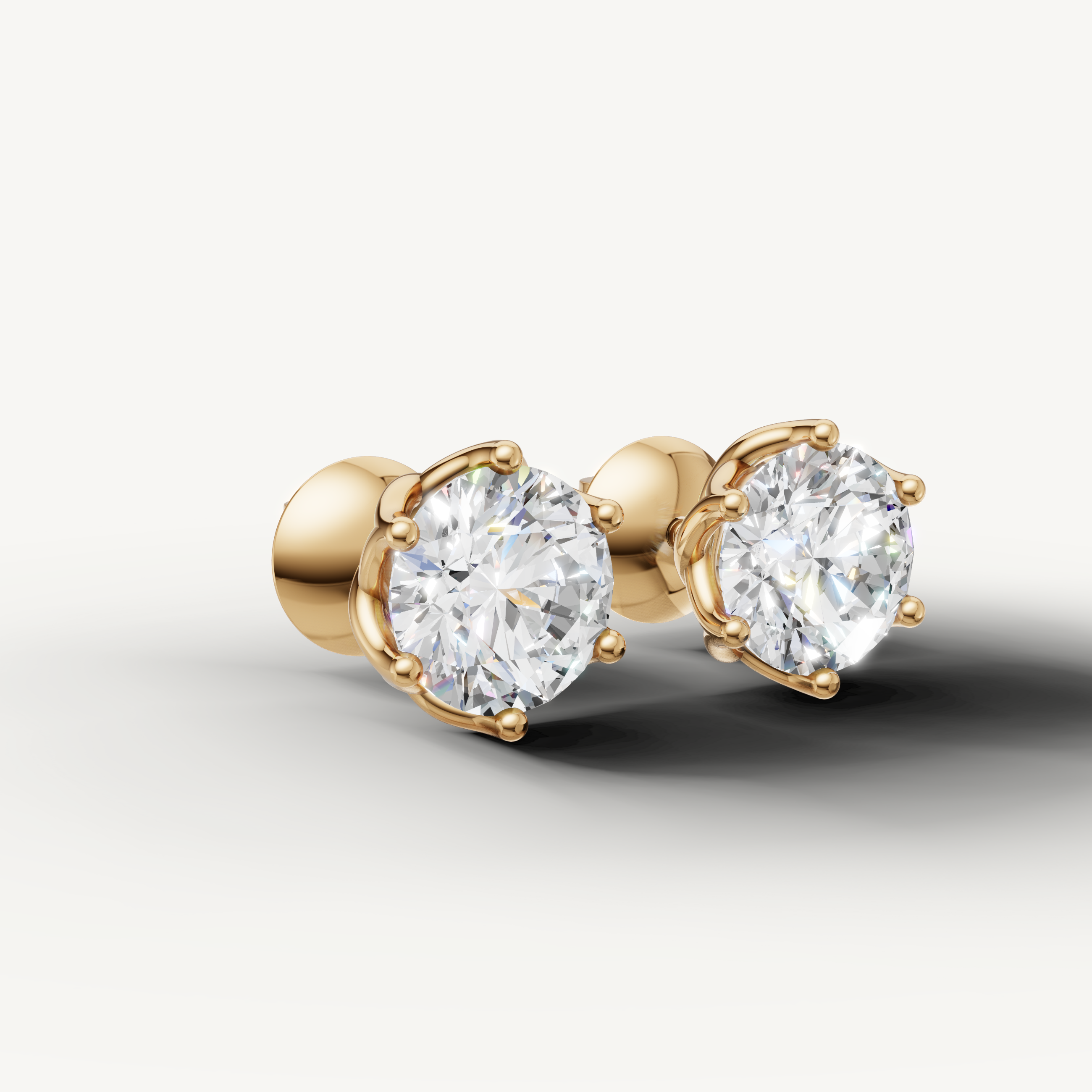 Luxury yellow gold solitaire diamond earrings for women by Raul Diamonds
