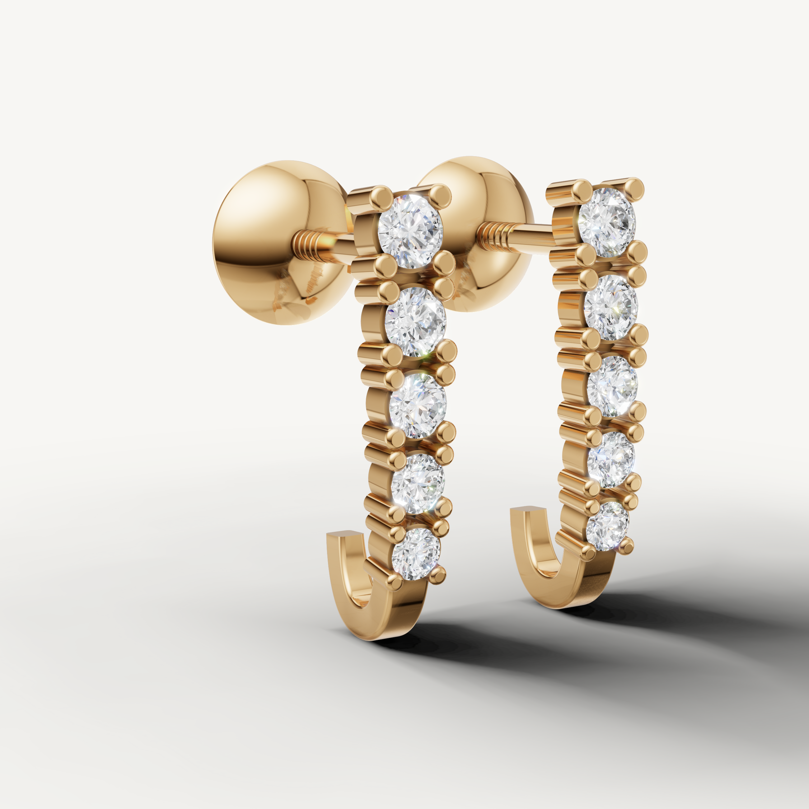 Luxury yellow gold diamond hoop earrings for women by Raul Diamonds