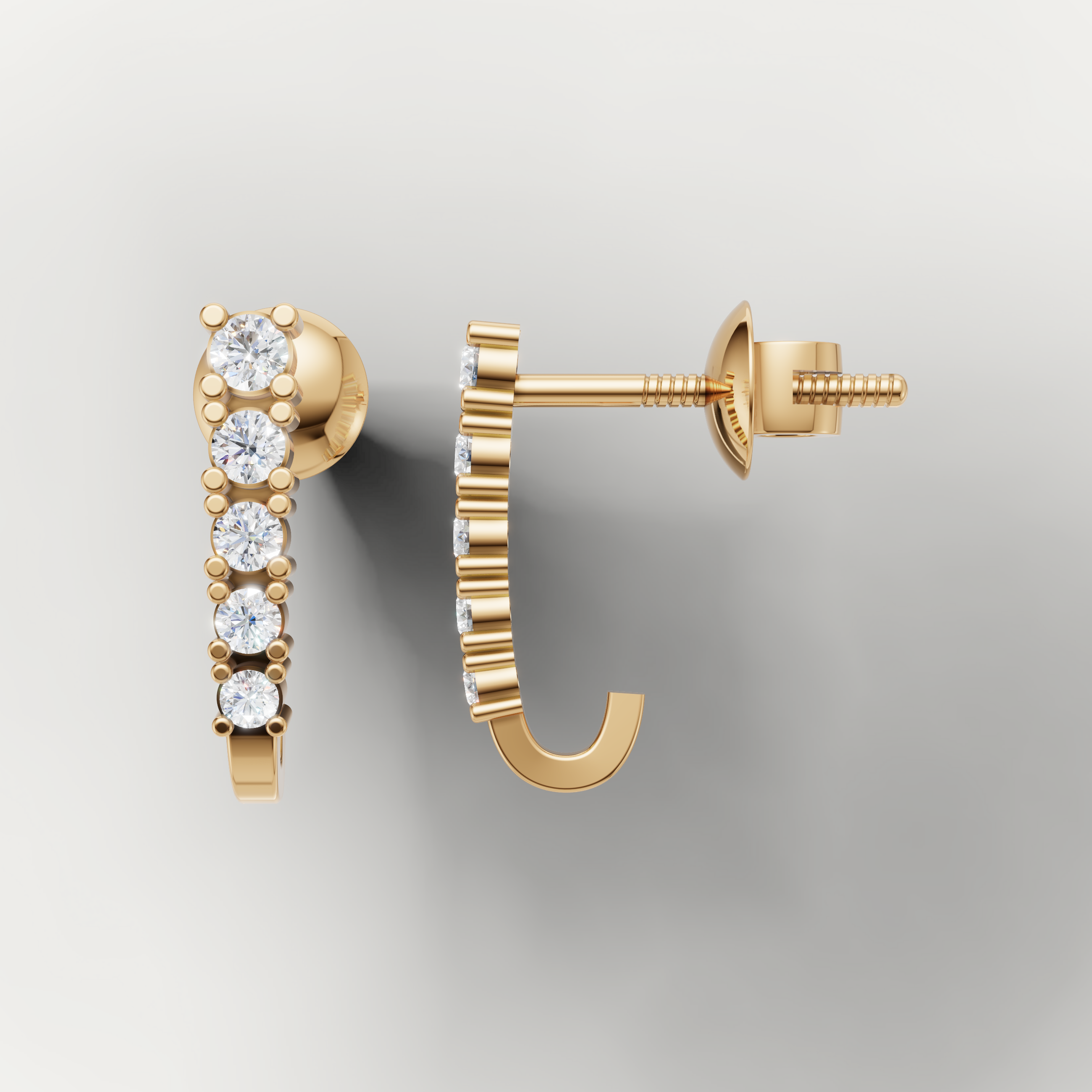 Yellow gold round diamond huggie earrings by Raul Diamonds with elegant sparkle