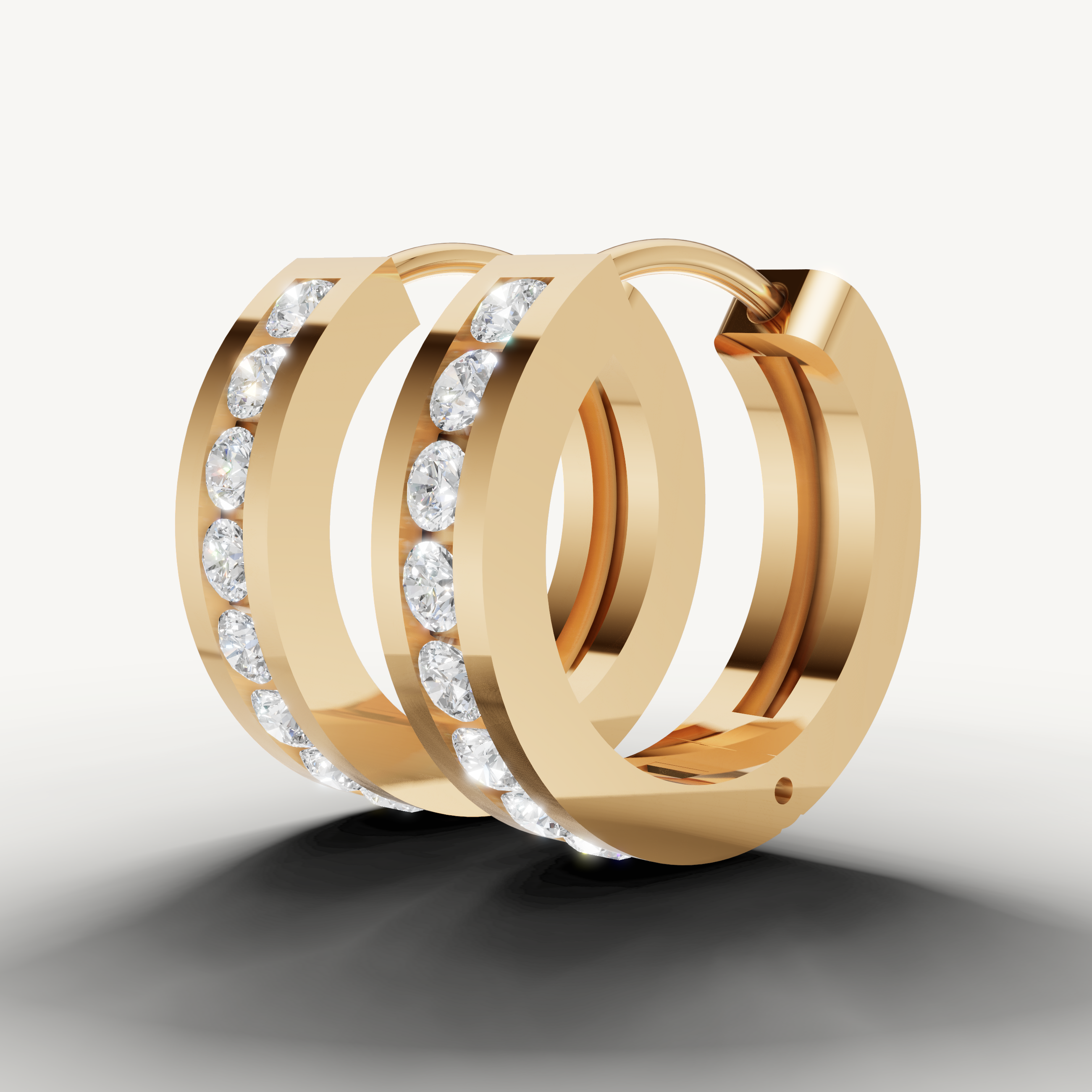 Raul Diamonds yellow gold hoop earrings with channel set round diamonds and contemporary luxury finish
