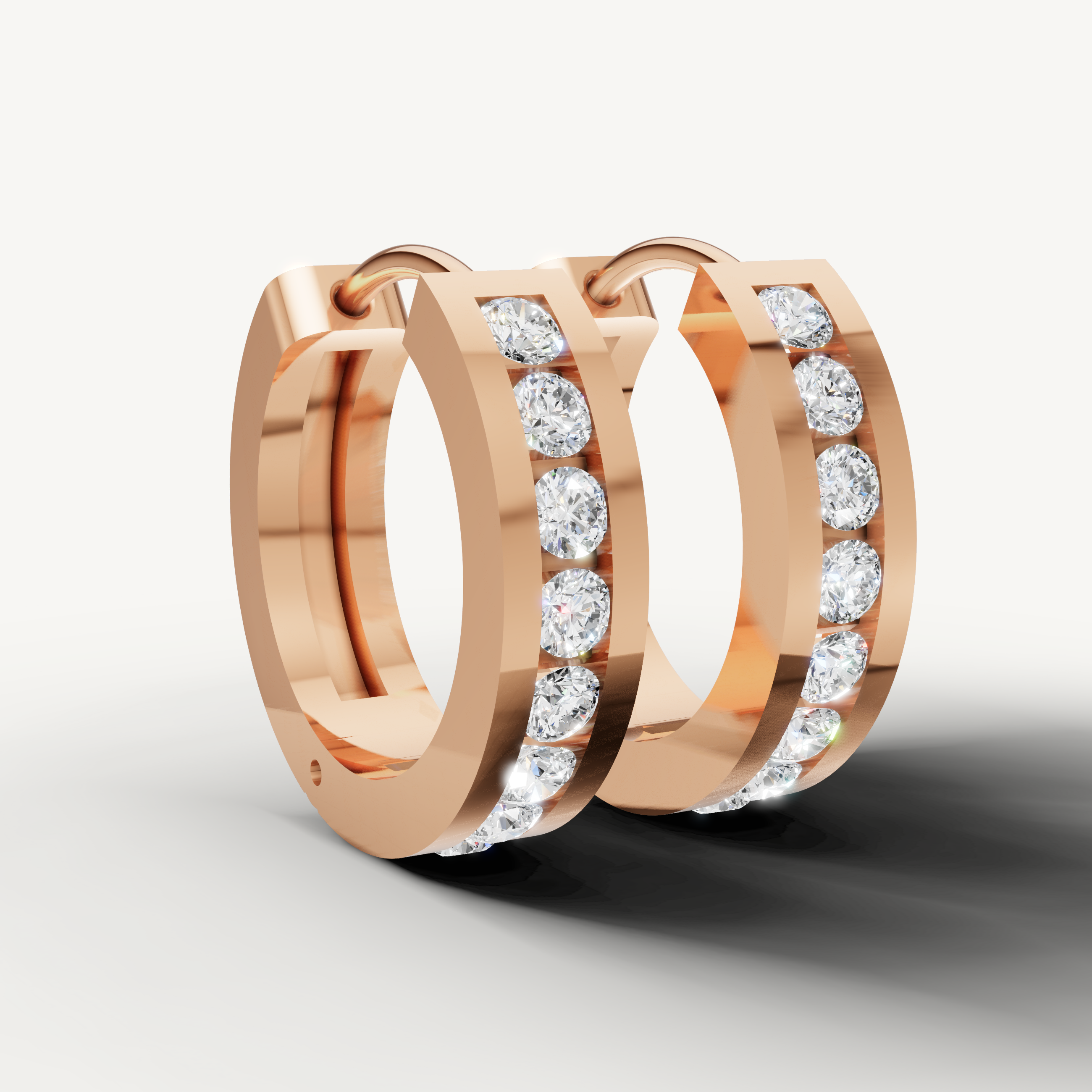 Rose gold luxury diamond earrings by Raul Diamonds featuring sparkling hoop design for everyday elegance