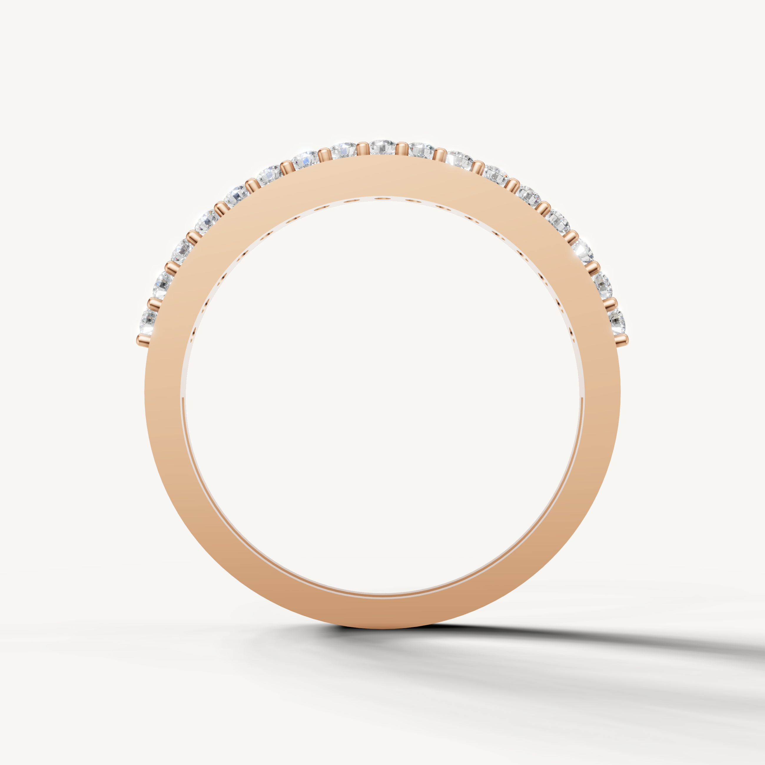 Fine rose gold eternity diamond ring by Raul Diamonds with classic minimalist detailing