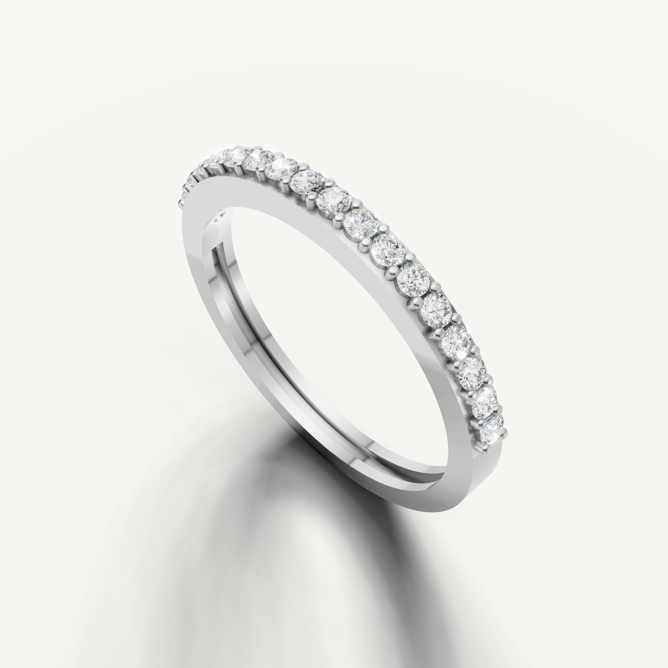 White gold minimalist diamond wedding band by Raul Diamonds with sparkling round stones