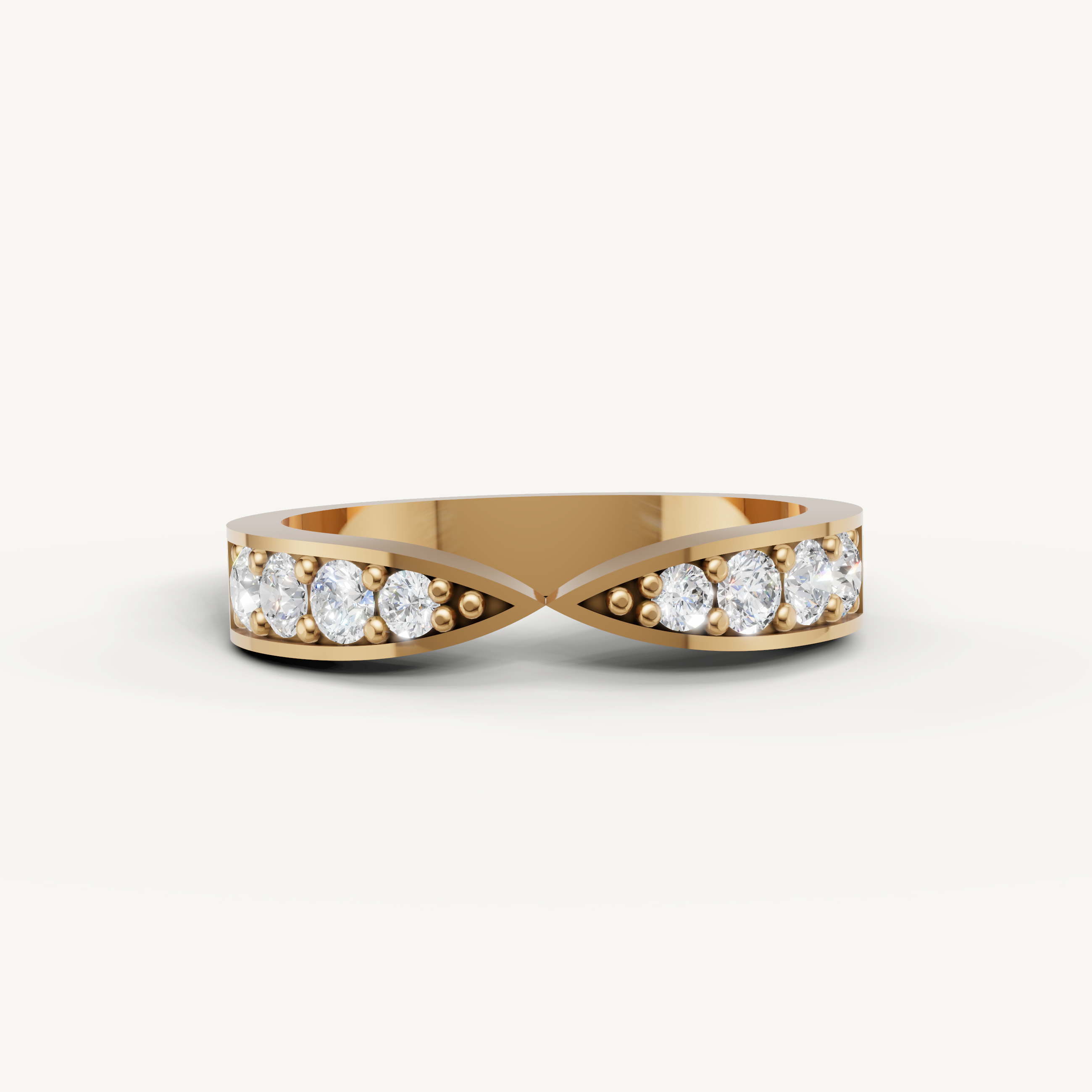 Raul Diamonds yellow gold infinity diamond wedding band with round brilliant diamonds and crossover design