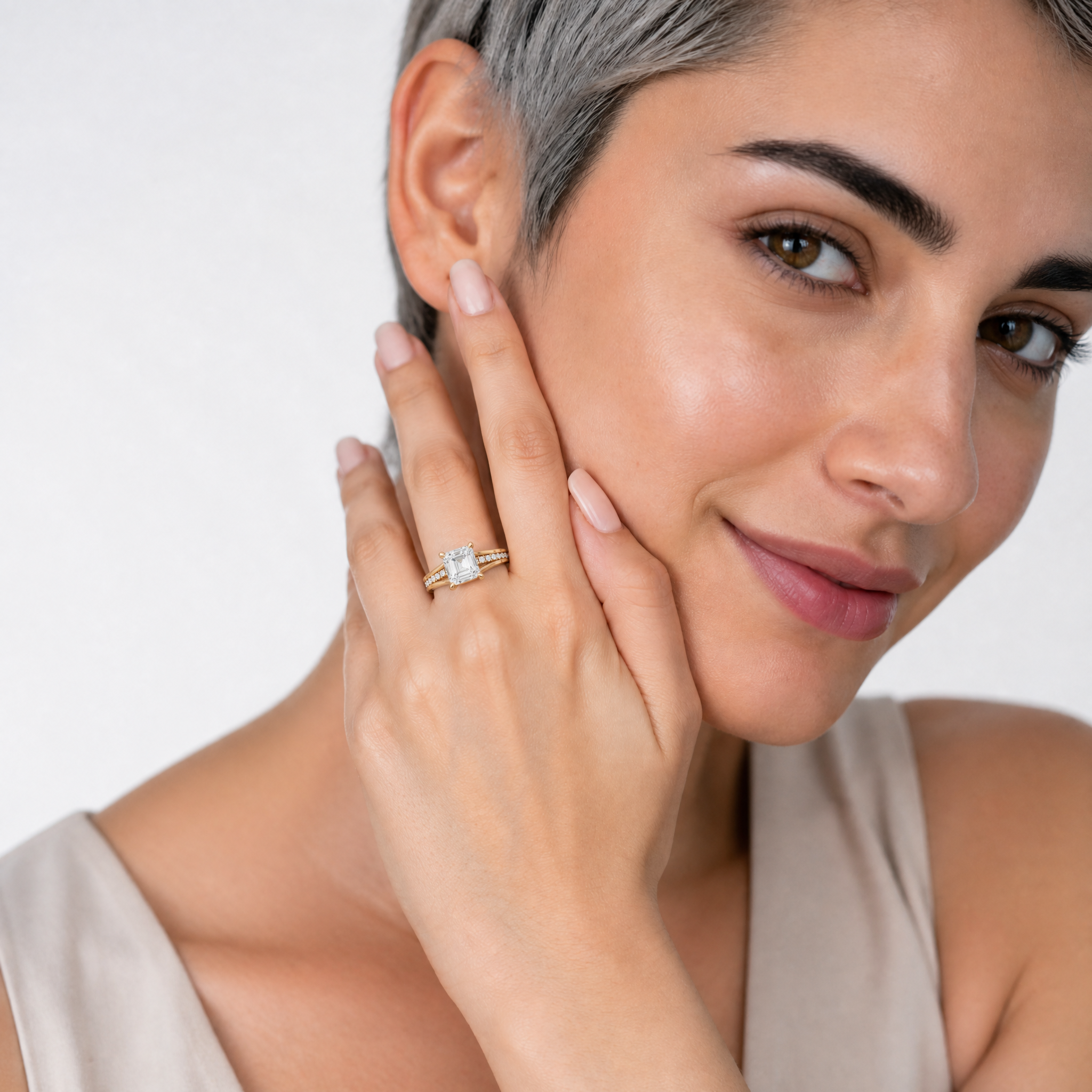 Elegant Model Wearing Asscher Cut Lab Grown Diamond Engagement Ring in 14K Yellow Gold – Raul Diamonds
