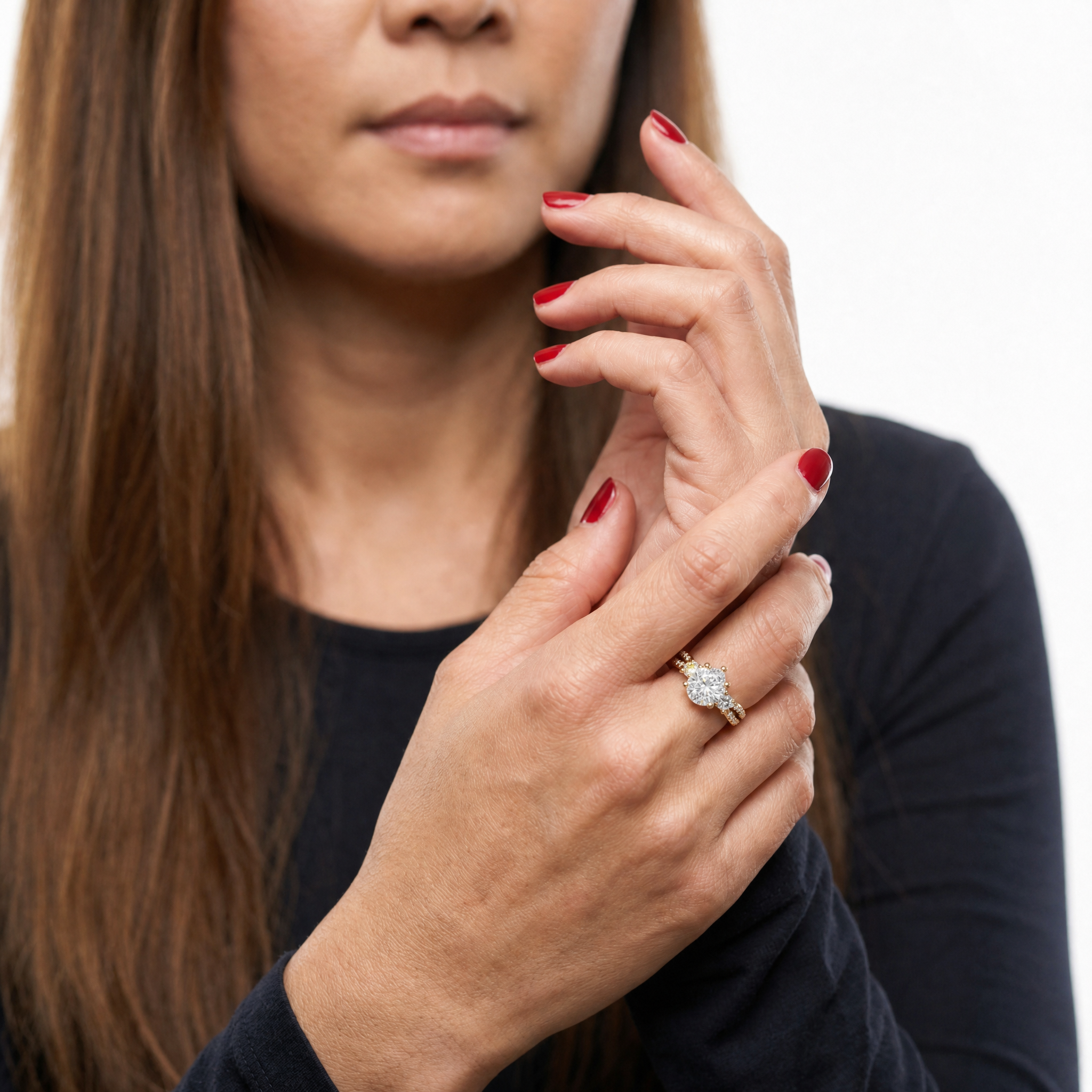 Elegant Model Wearing Round Three Stone Lab Grown Diamond Engagement Ring in 14K Yellow Gold – Raul Diamonds