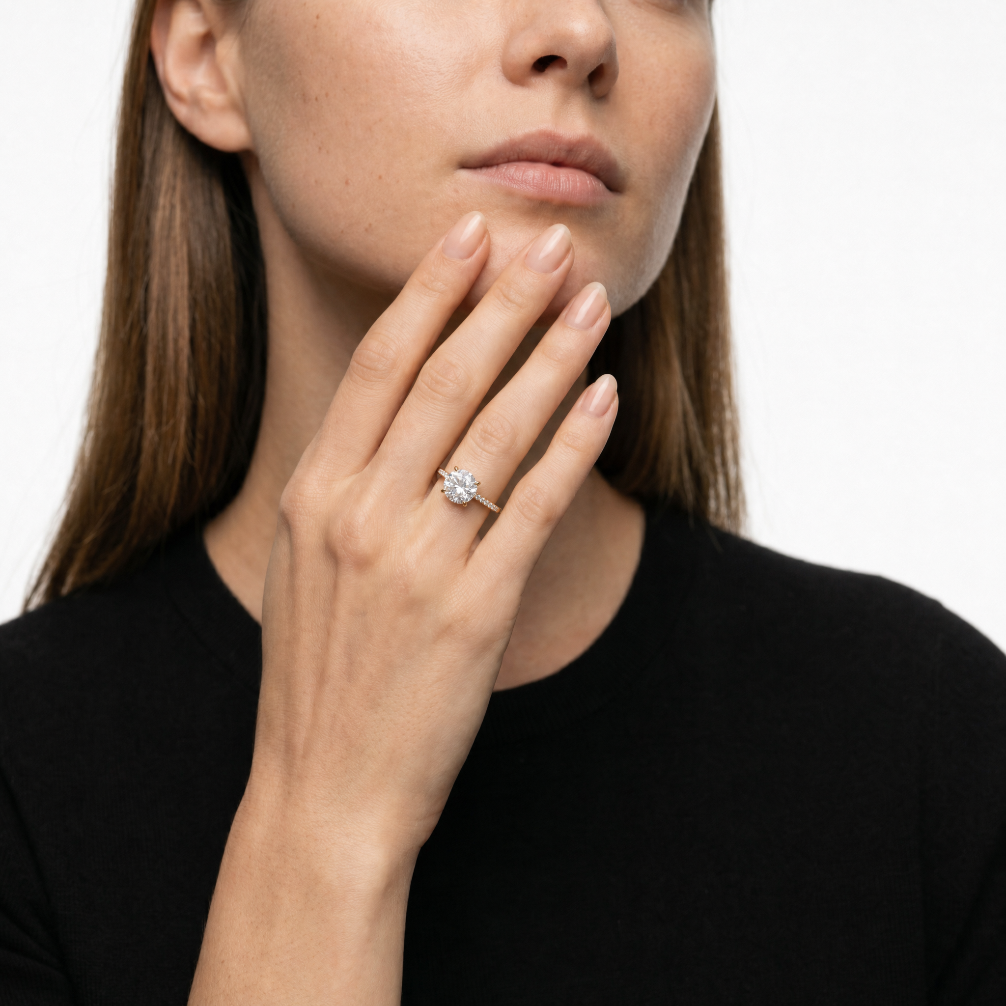Elegant Model Wearing Round Cut Lab Grown Diamond Engagement Ring in 14K Yellow Gold – Raul Diamonds