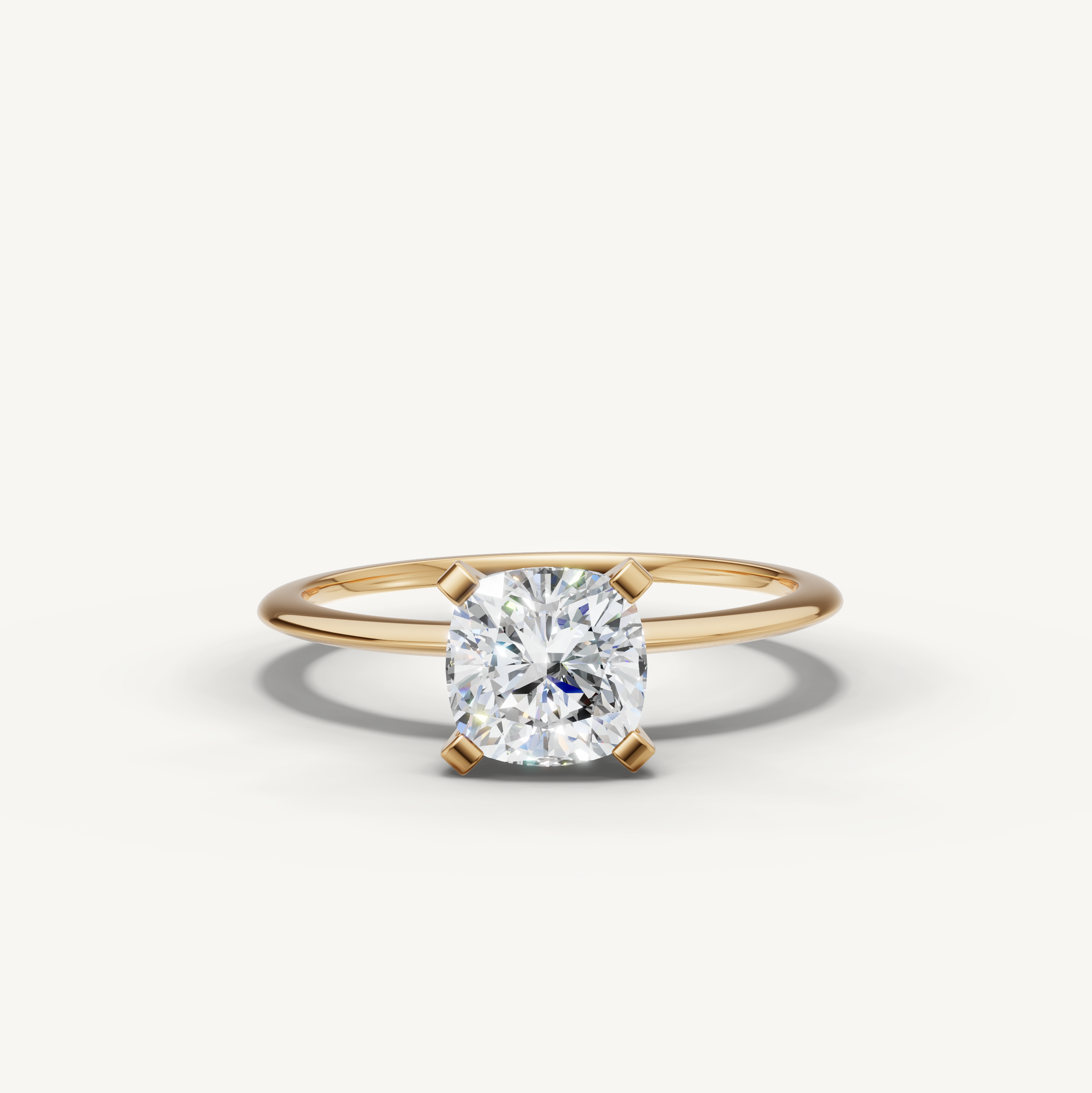 Cushion cut lab grown diamond solitaire engagement ring in yellow gold by Raul Diamonds
