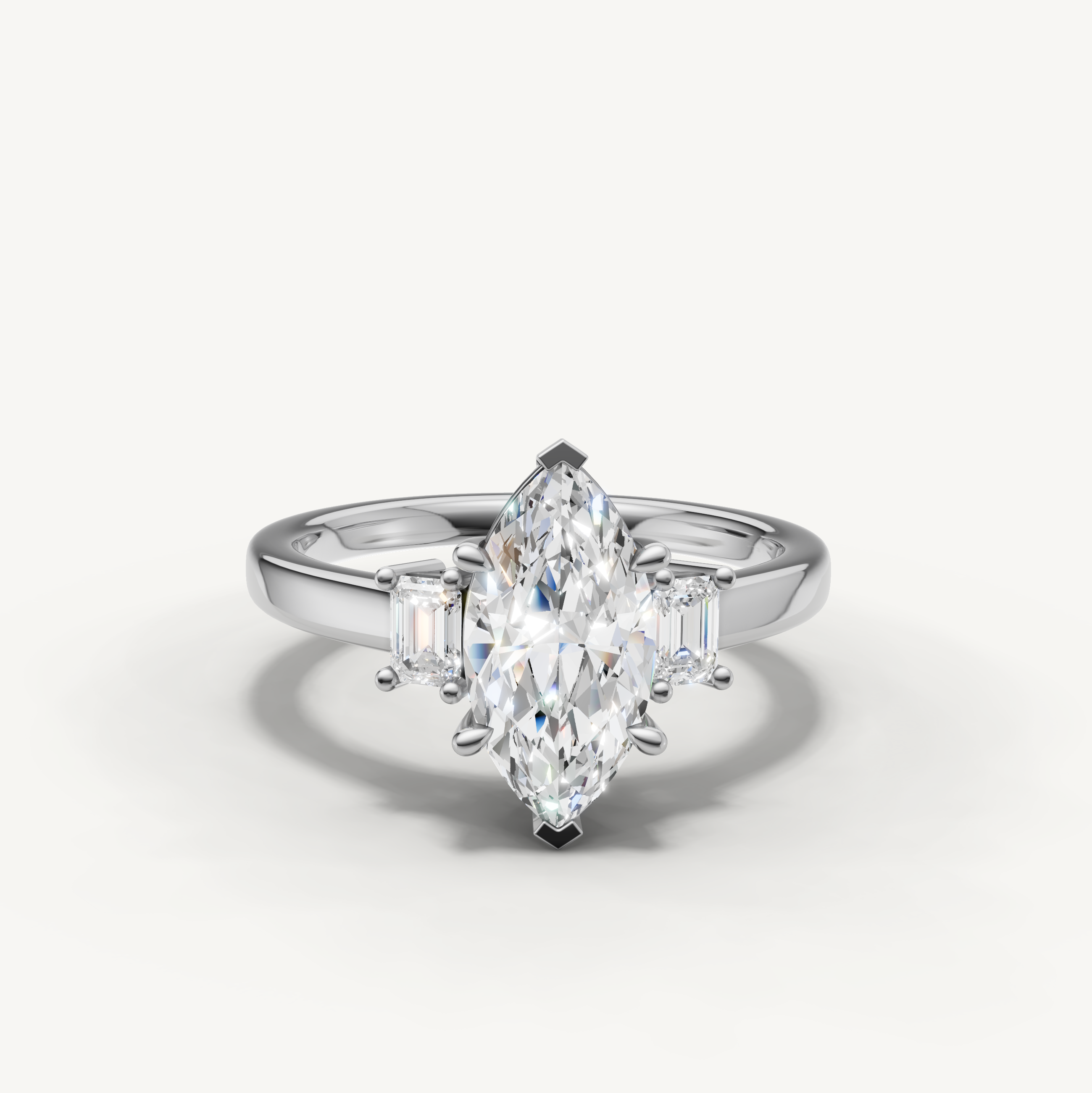 14K white gold marquise lab grown diamond ring with tapered baguette side diamonds and polished band