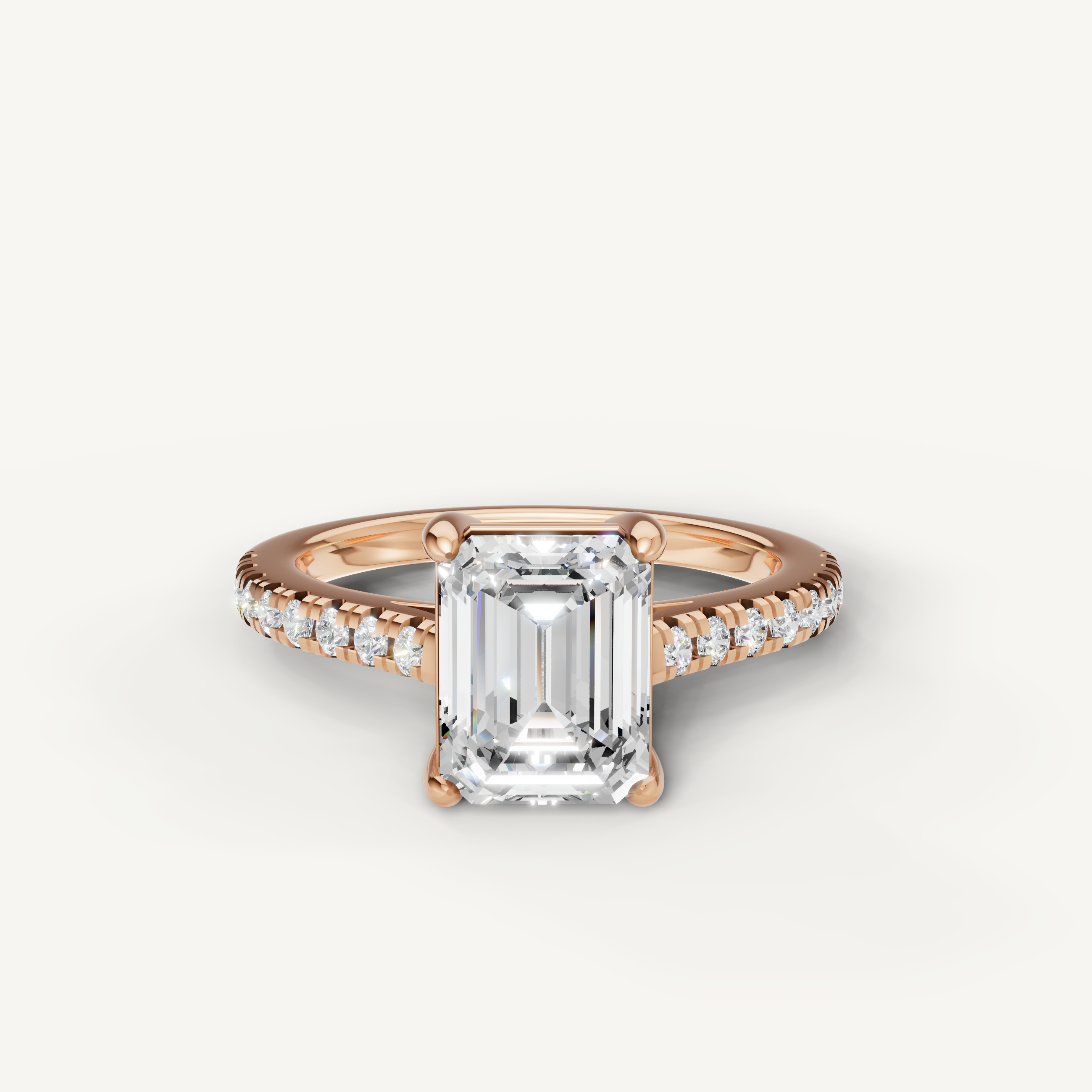 Emerald cut lab grown diamond engagement ring in 14K rose gold with pavé diamond band