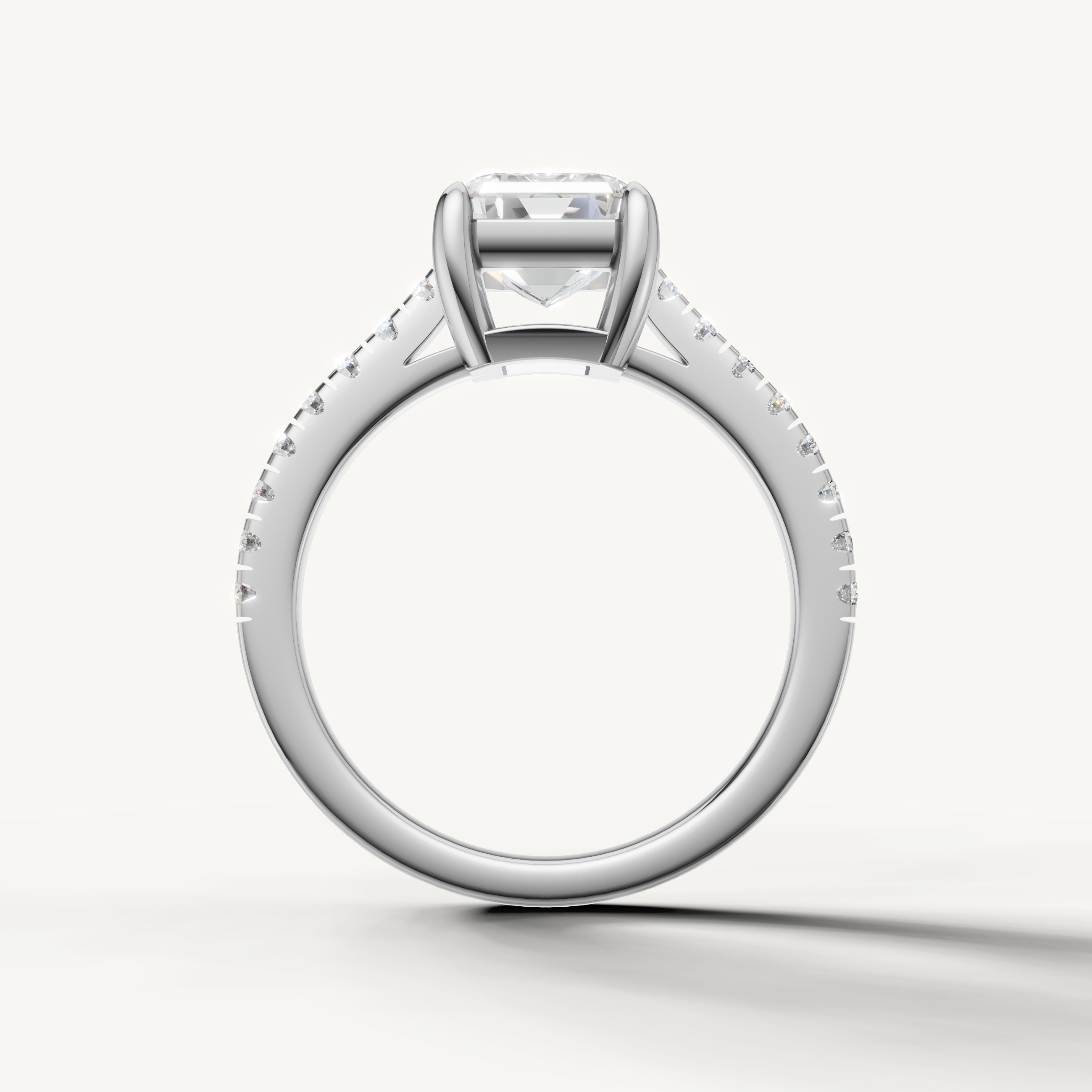Elegant emerald cut lab grown diamond ring in white gold with pavé diamonds
