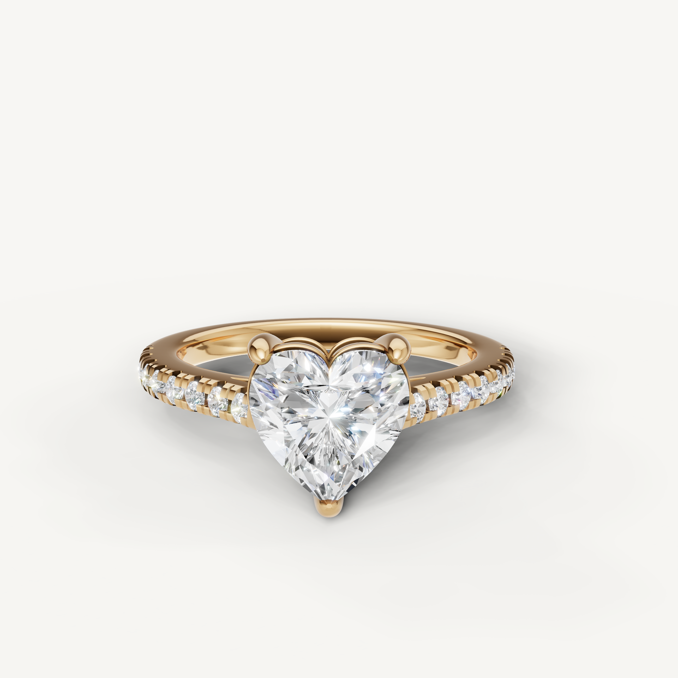 Heart shaped lab grown diamond engagement ring in 14K yellow gold with pavé diamond band