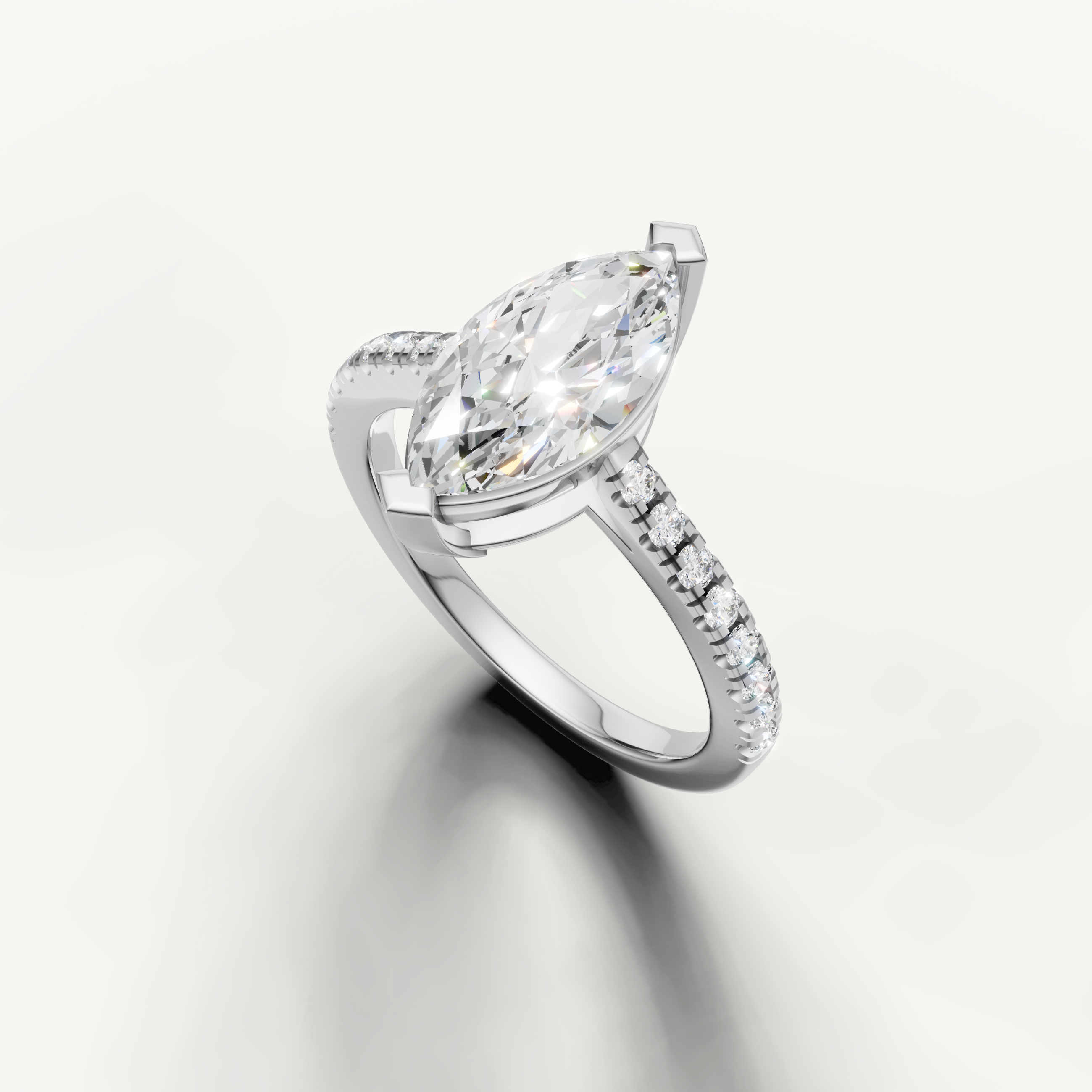 14K white gold marquise cut diamond ring with pavé band and elongated silhouette