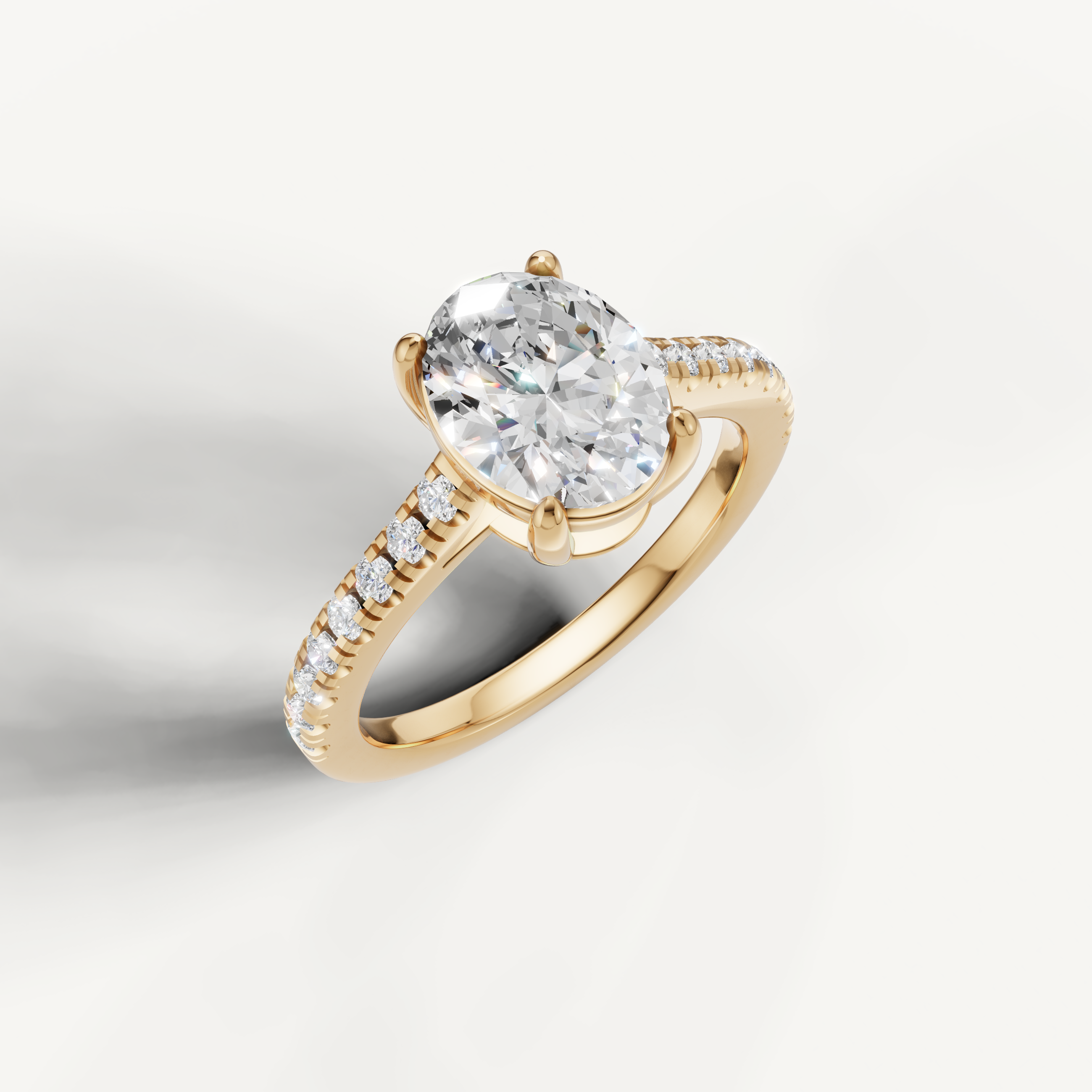 14K yellow gold oval lab grown diamond ring with micro pavé setting and classic design