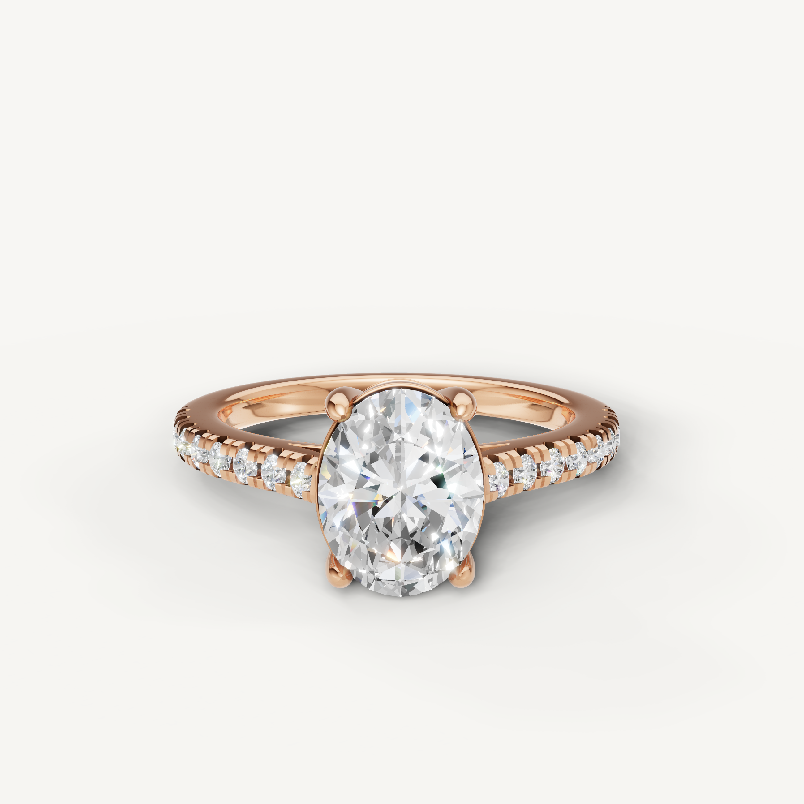 Oval cut lab grown diamond engagement ring in 14K rose gold with pavé diamond band