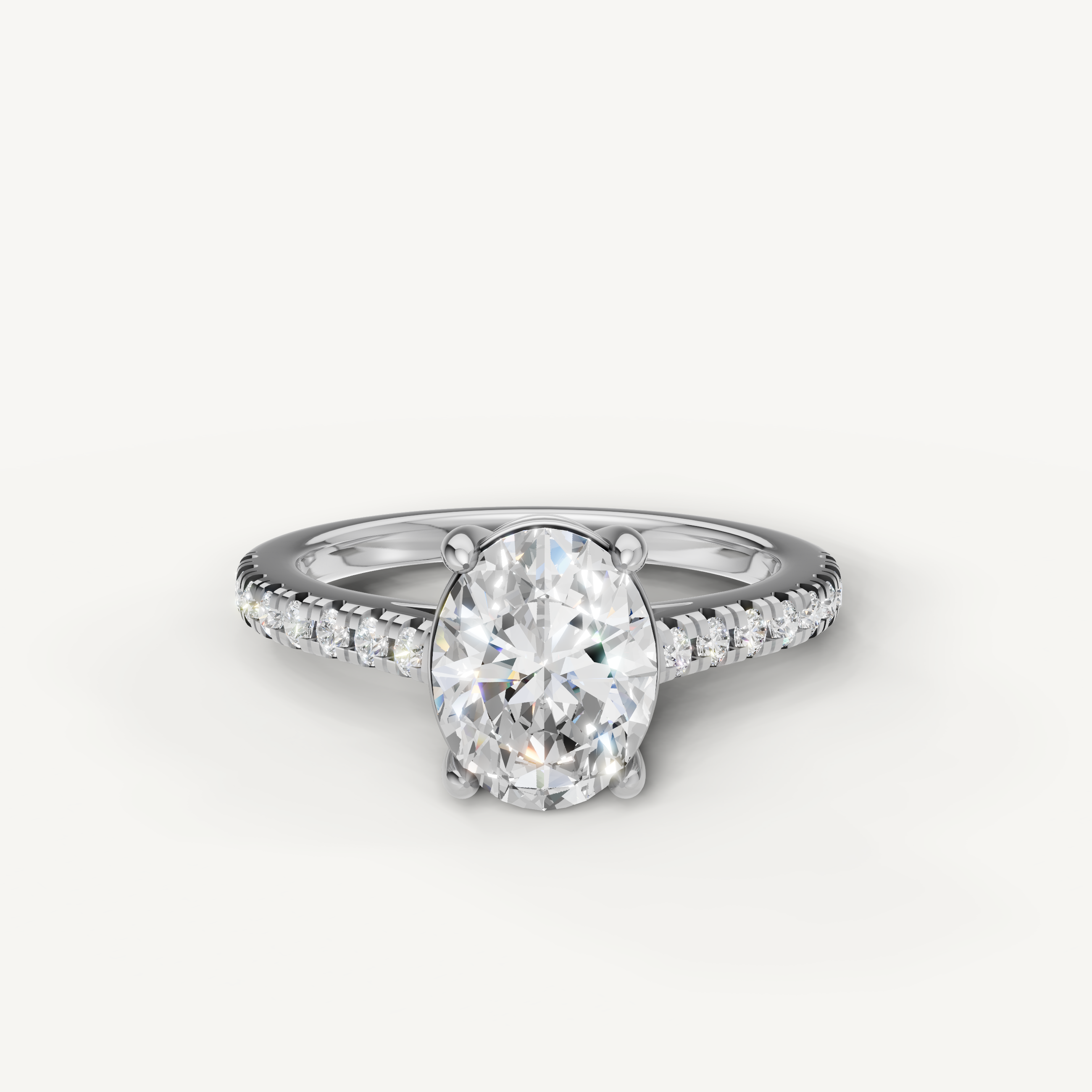 Oval cut lab grown diamond engagement ring in 14K white gold with pavé diamond band