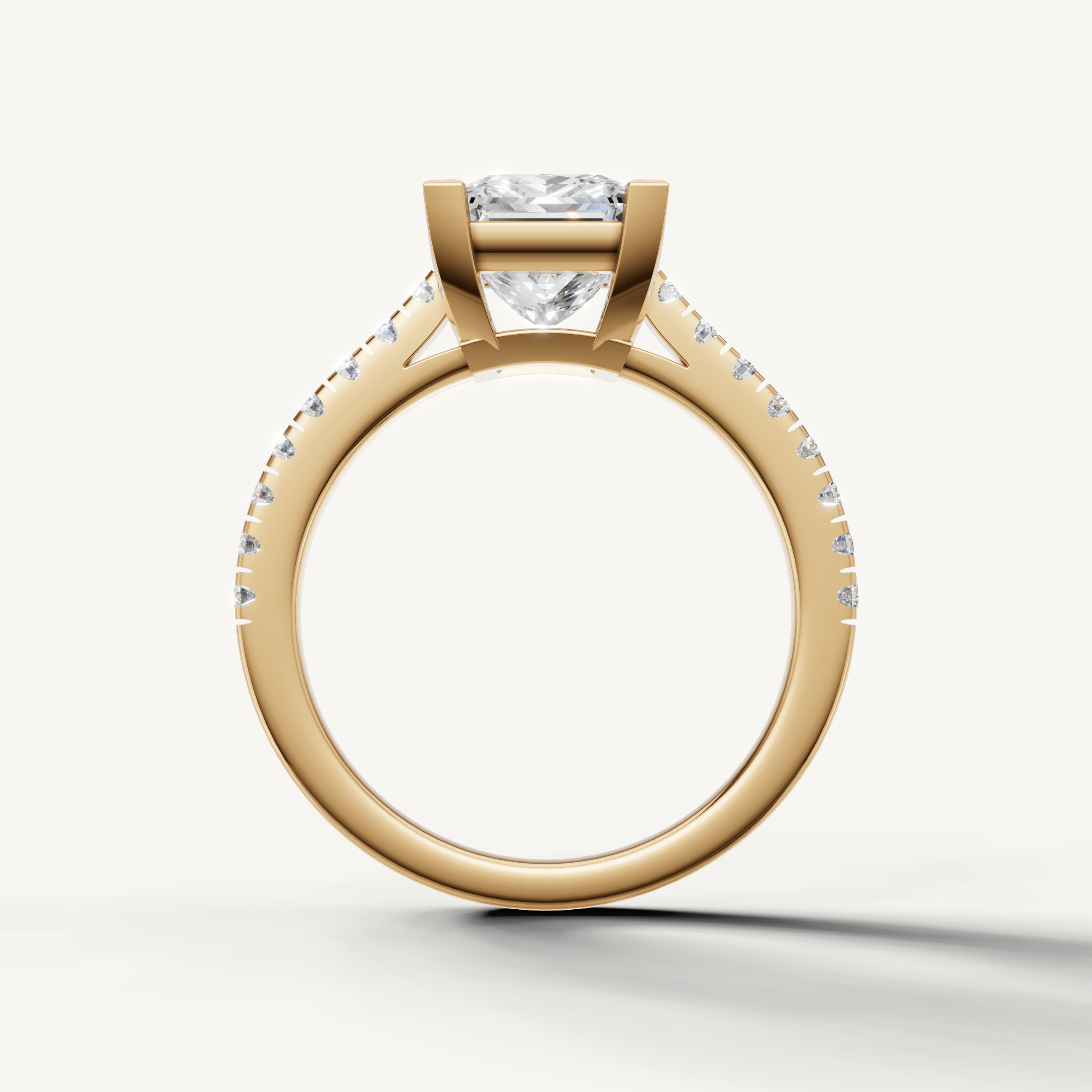 Elegant yellow gold princess cut diamond engagement ring with timeless brilliance by Raul Diamonds